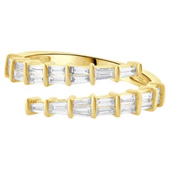 18 Karat Yellow Gold Graduated Baguette Diamond Bypass Ring