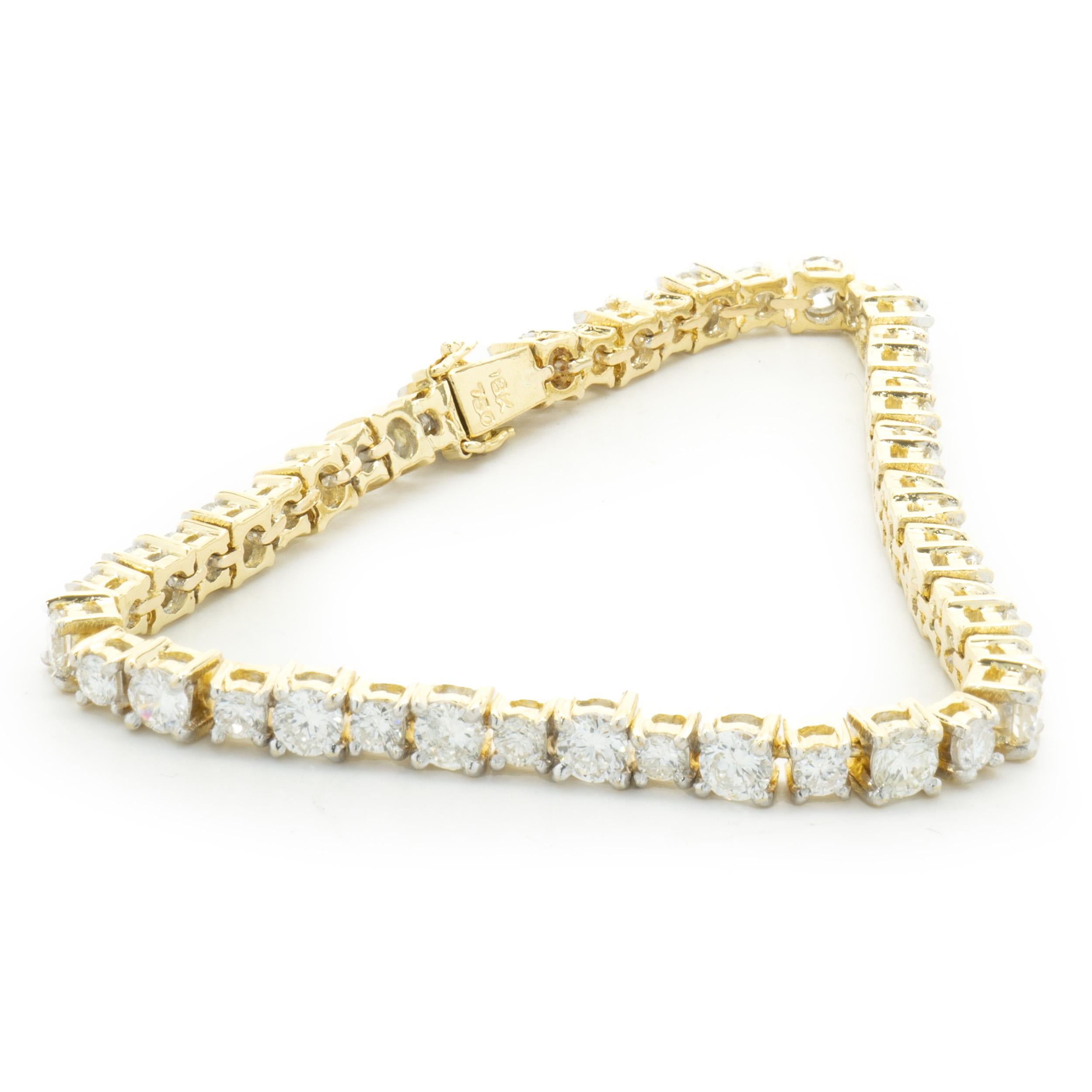 Designer: custom design
Material: 18K yellow gold
Diamond:48 round brilliant cut = 4.00cttw
Color: H
Clarity: VS1-2
Dimensions: bracelet will fit up to a 5.75-inch wrist
Weight: 11.07 grams
