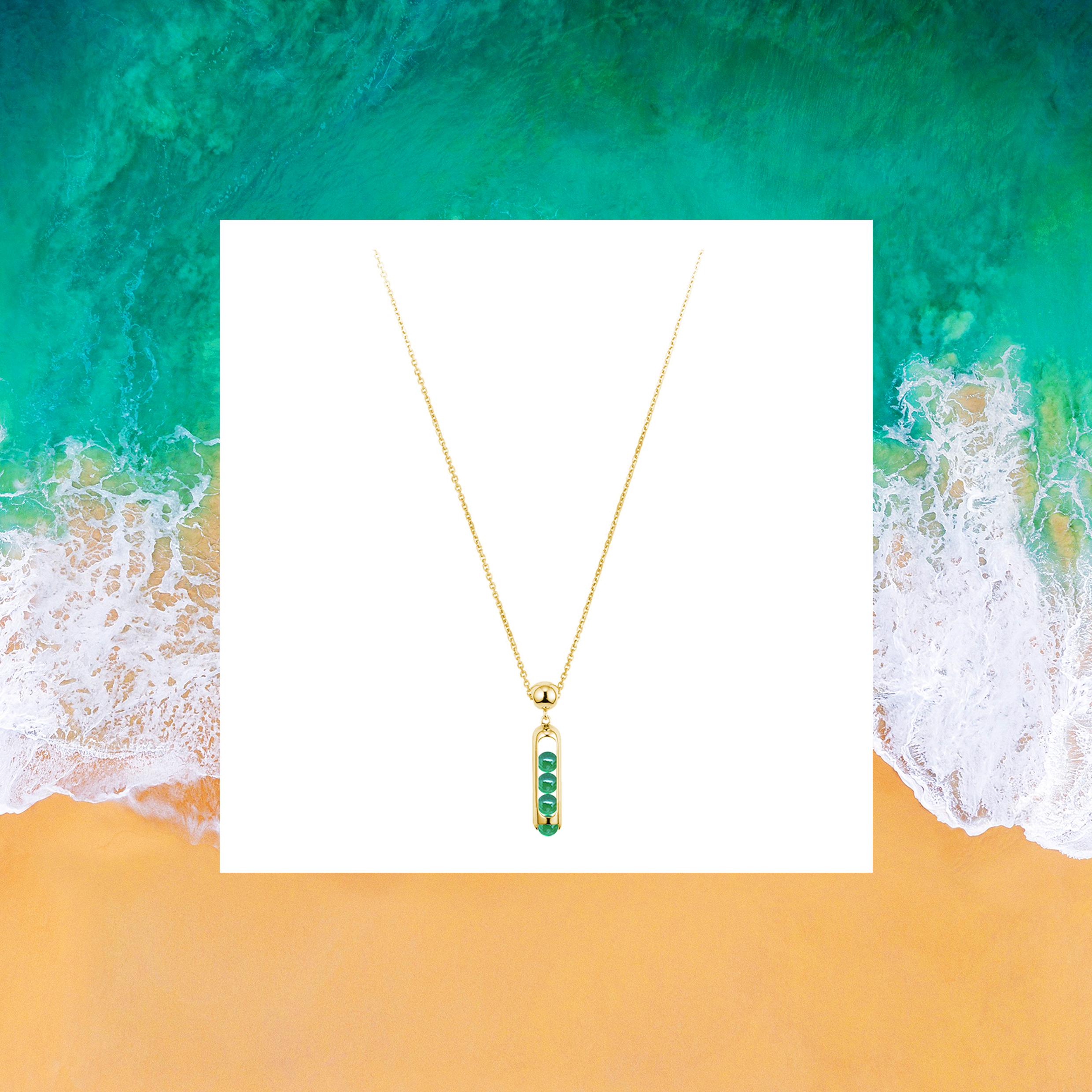 This unisex Melody pendant necklace combines perfect hand carved green Chalcedony beads that roll within their 18 karat gold. Gold award winning Melody collection is a clever design solution.  Each piece incorporates a unique movement mechanism so