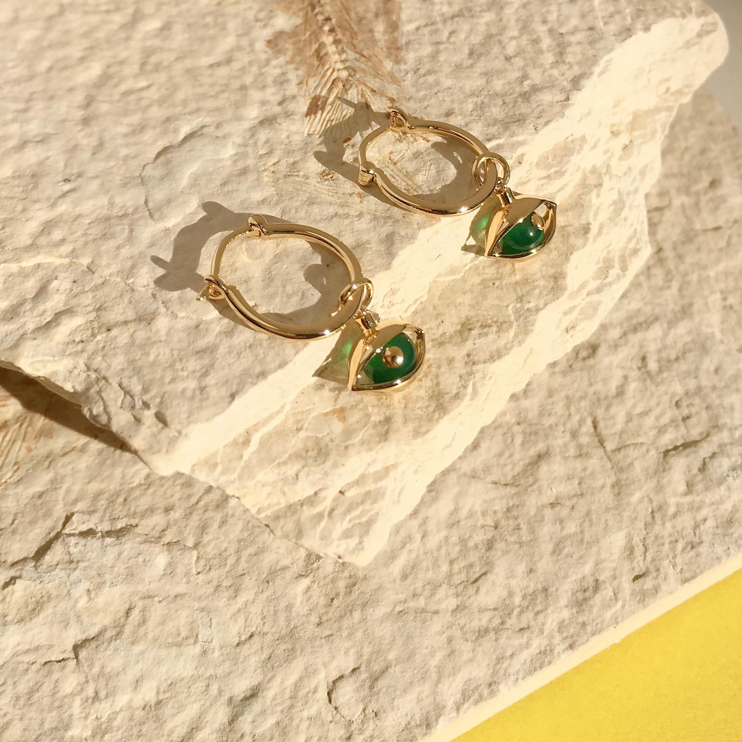 This very unique eye mini hoop earrings from The Eye collection, it's a perfect everyday talisman, elegant and stylish.  The Eye collection, showcases this award winning, fine jewellery designer’s extraordinary talent to work with shapes, materials,