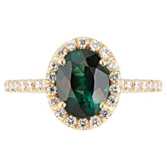 18 Karat Yellow Gold Green Tourmaline Ring with Diamond Halo