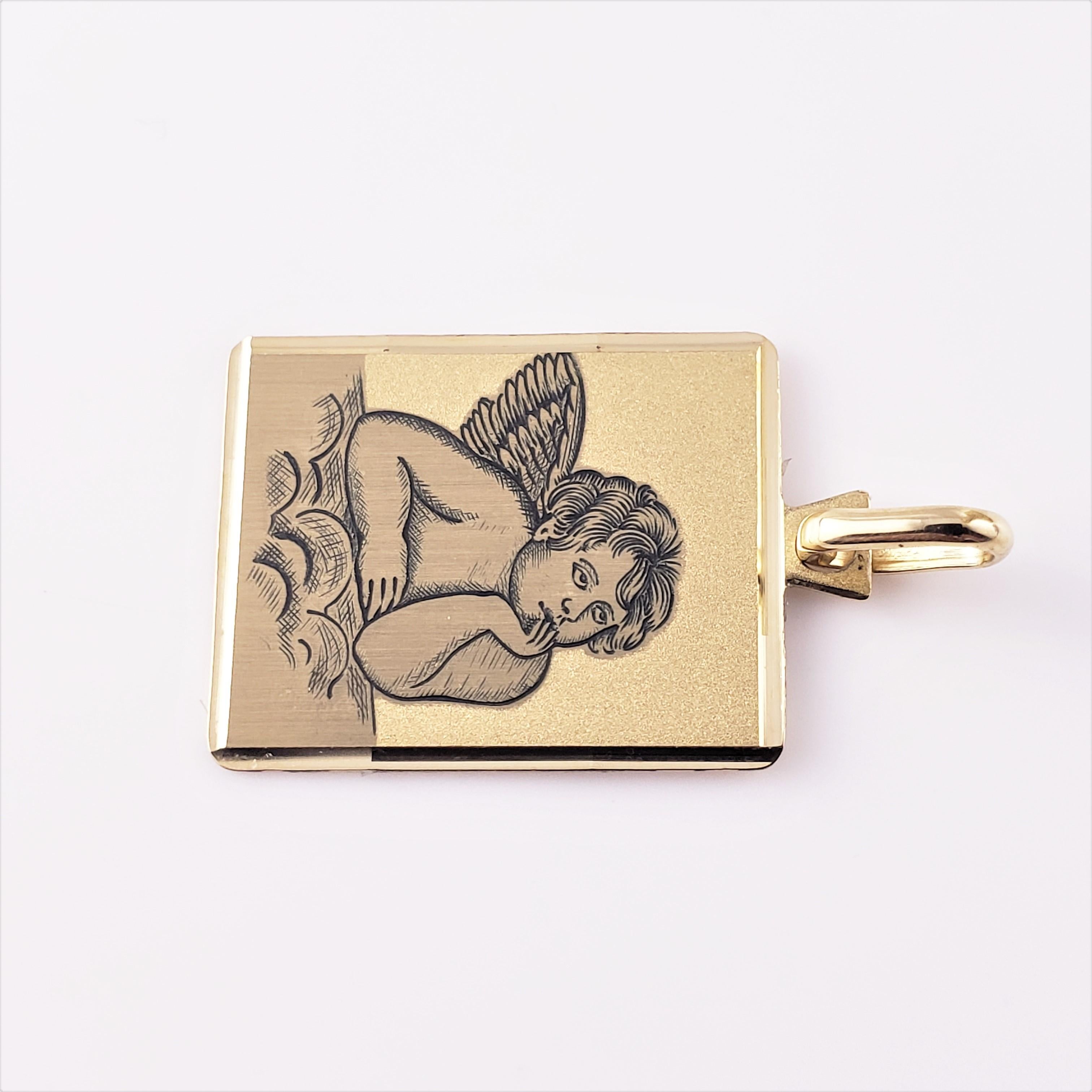 18 Karat Yellow Gold Guardian Angel Pendant-

This lovely pendant features an etched guardian angel in beautifully detailed 18K yellow gold.

Size:  23 mm x 16 mm

Weight:  1.8 dwt. /  2.8 gr.

Stamped: 750

Very good condition, professionally