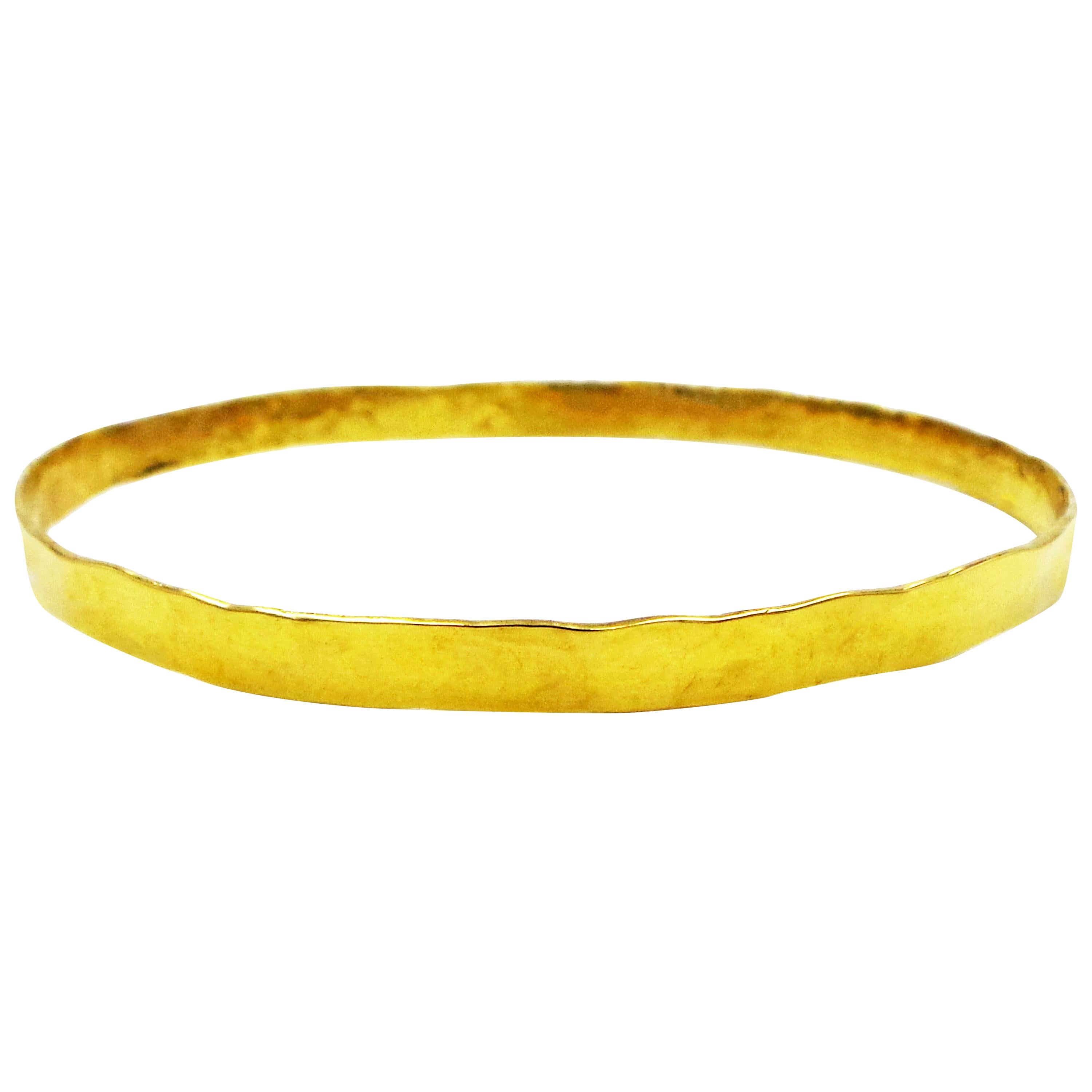 18 Karat Yellow Gold Hammered Skinny Bangle
