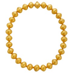 18 Karat Yellow Gold Hammered Tapered Gold Ball Necklace