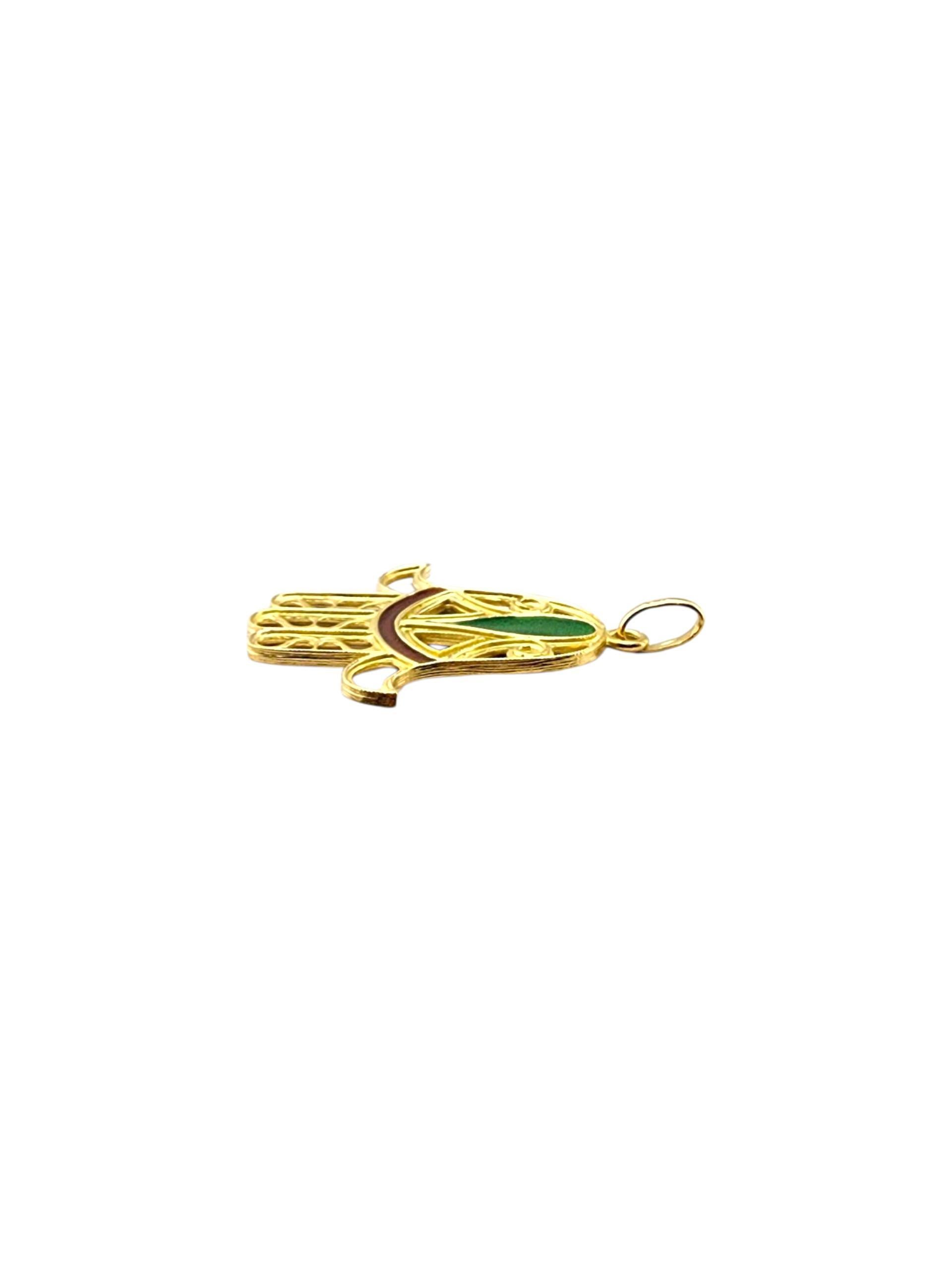 Ciondolo Hamsa Mano di Fatima reversibile in oro giallo 18 carati

Questo ciondolo Hamsa Hand of Fatima in oro giallo 18 carati presenta una finitura lucida e dettagli intricati del tradizionale simbolo protettivo. Un disegno significativo che si