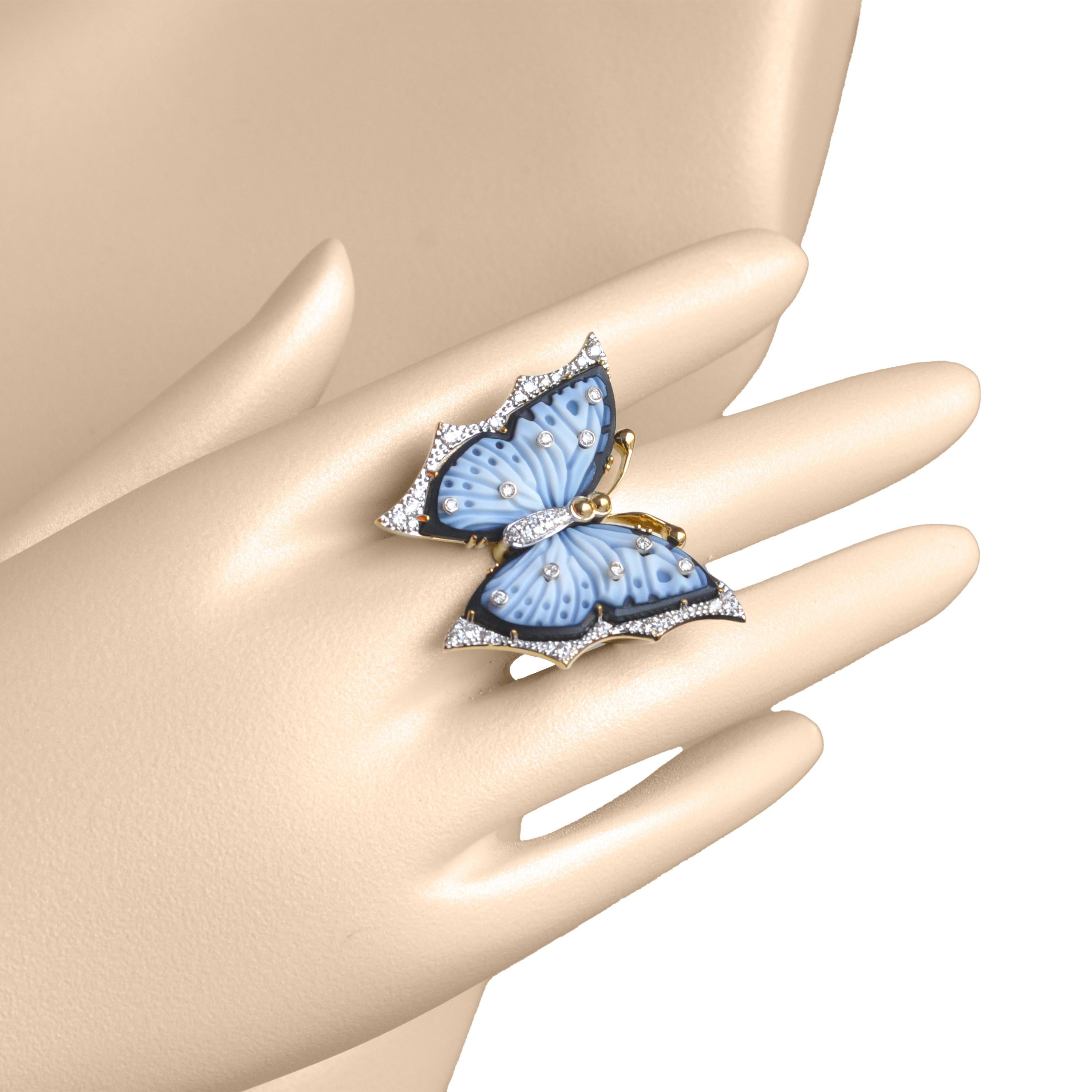 18 karat yellow gold hand-carved natural agate butterfly  cocktail ring.

Embrace nature's metamorphosis with our 18k gold hand-carved agate butterfly cocktail diamond ring. Meticulously carved, two agate pieces evolve into a stunning butterfly