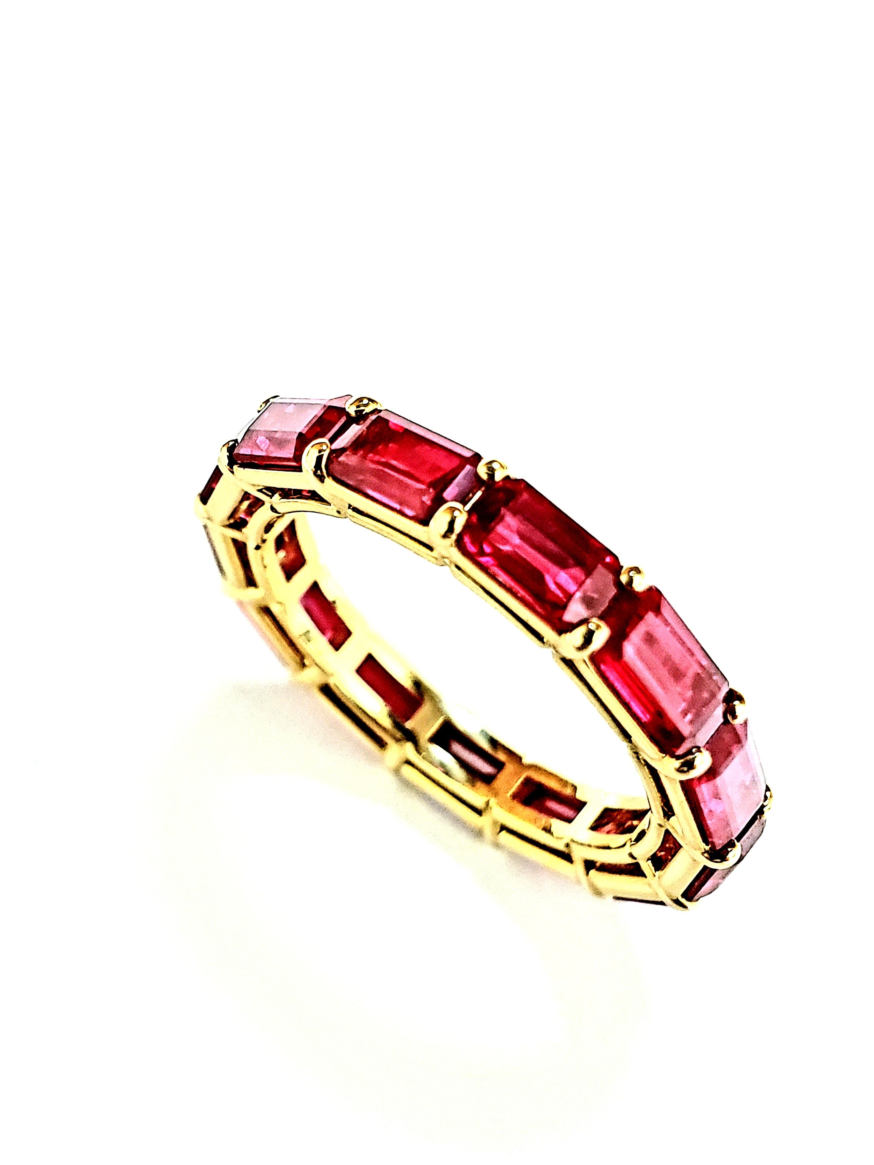 From Our Showroom, a One of a Kind, Handmade 18 Karat Yellow Gold & Natural Burmese Ruby Ring.
Ring is Set East-West in a Common Prong Mounting, with an Open Gallery.
13 Rubies total 4.55 Carats.
Ring is a Size 6. It Can't Be Sized, But Can Be
Made