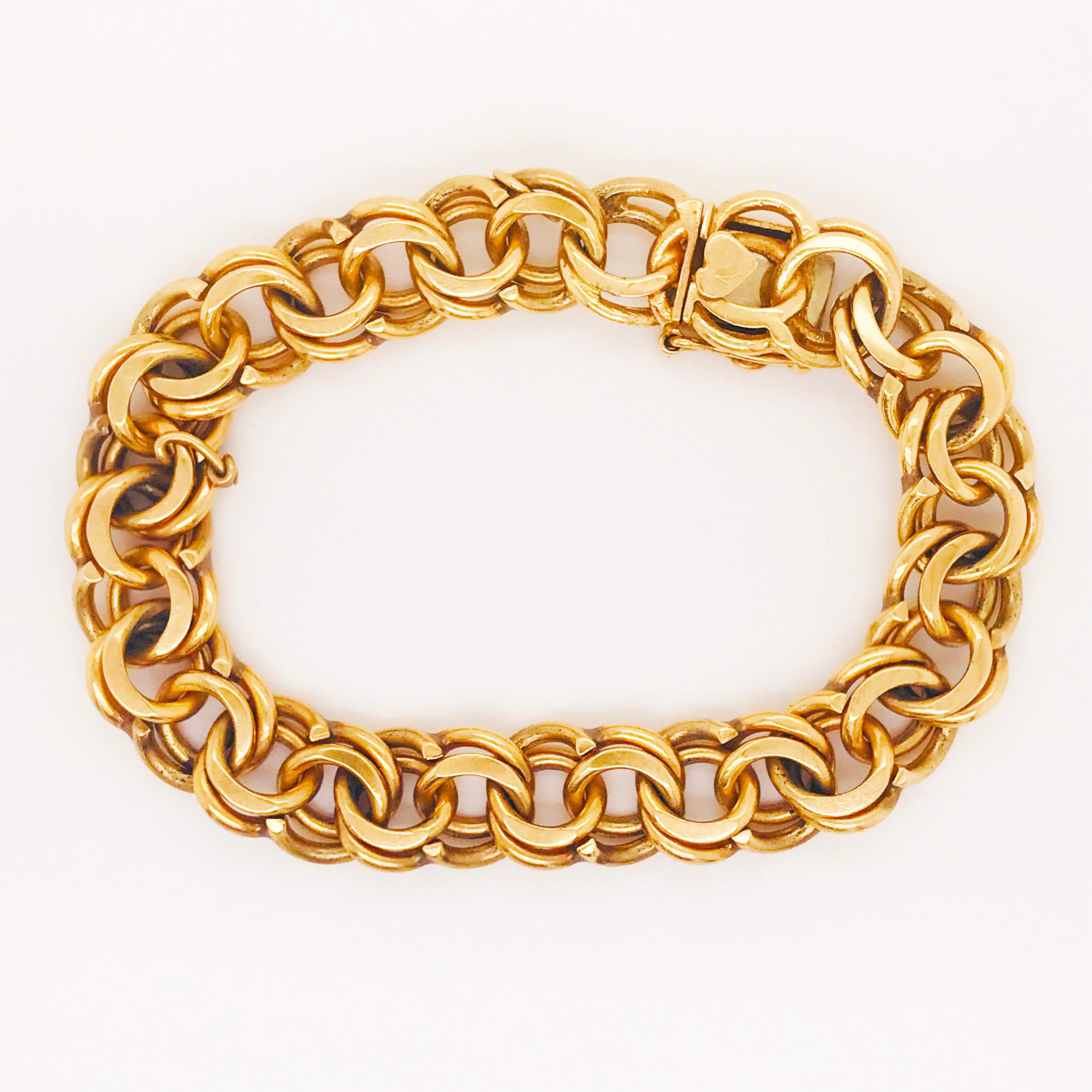 This is a hand made double link bracelet. Each link was hand made and put together to make this gorgeous, double link design. The bracelet is solid 18 karat yellow gold with a unique, one of a kind clasp. This clasp has a very special feature, there