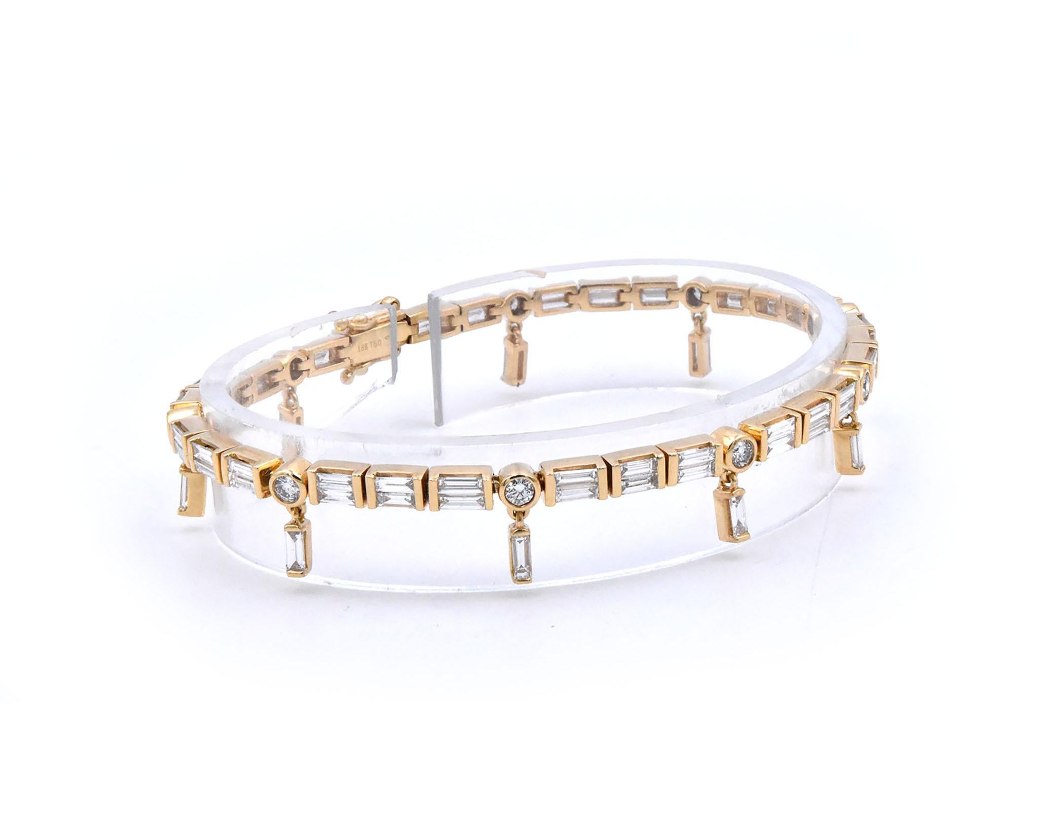 Material: 18K yellow gold
Diamonds: 74 baguette and round cut = 3.38cttw
Color: G
Clarity: VS1
Dimensions: bracelet will fit up to a 7-inch wrist
Weight: 15.37 grams
