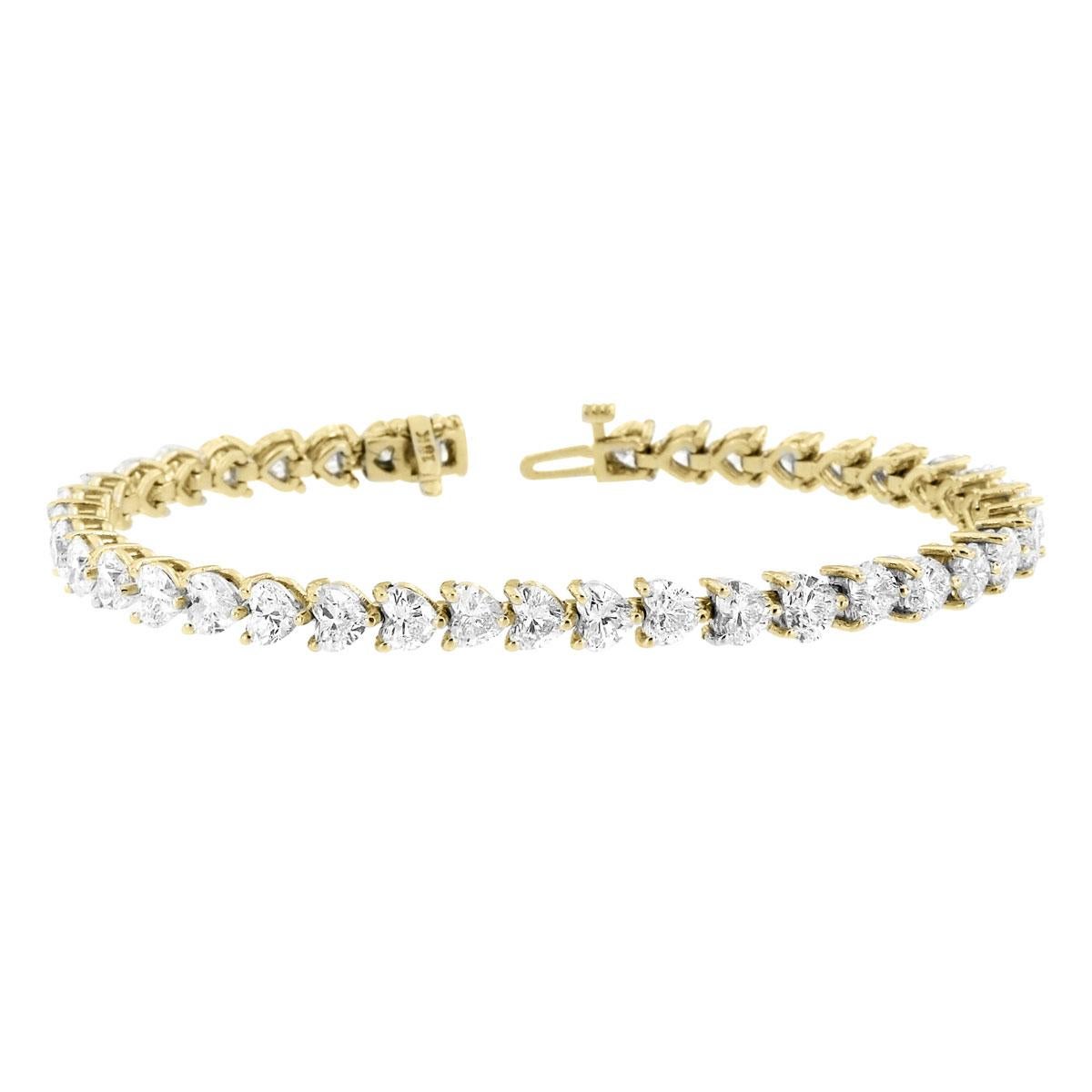 This timeless four prongs diamonds tennis bracelet feature 39 perfectly matched Heart Shape Diamonds. Experience the Difference!

Product details: 

Center Gemstone Type: NATURAL DIAMOND
Center Gemstone Color: WHITE
Center Gemstone Shape: