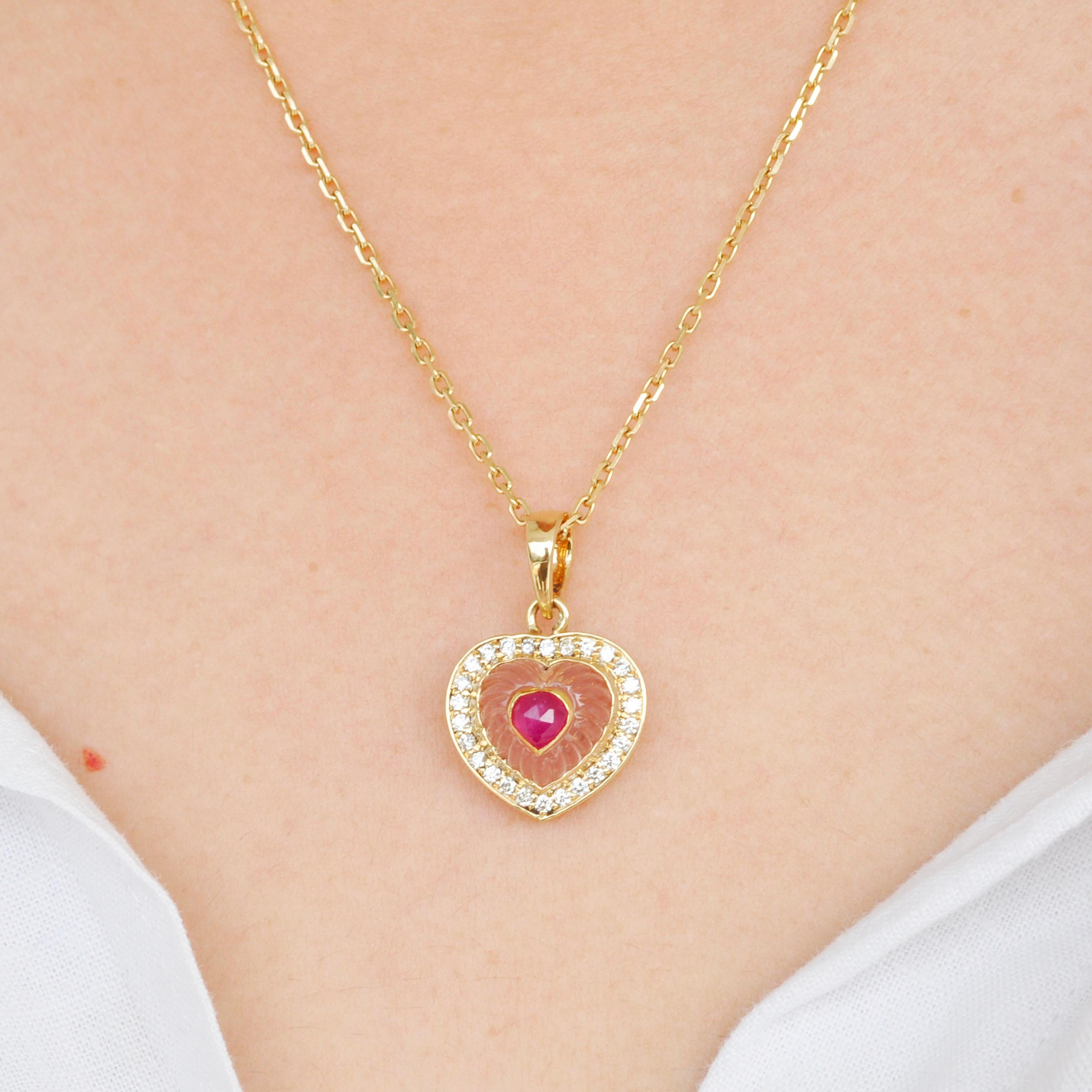 18 karat yellow gold heart rose quartz ruby diamond valentine pendant necklace

This beautiful elegant pendant features a natural Rose Quartz heart shaped carving at the centre, bezel set in 18 karat gold, with a heart shaped natural ruby set