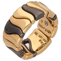 Marina B. Bague souple en or jaune 18 carats et hématite