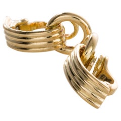 Clips d'oreilles Hermès en or jaune 18 carats