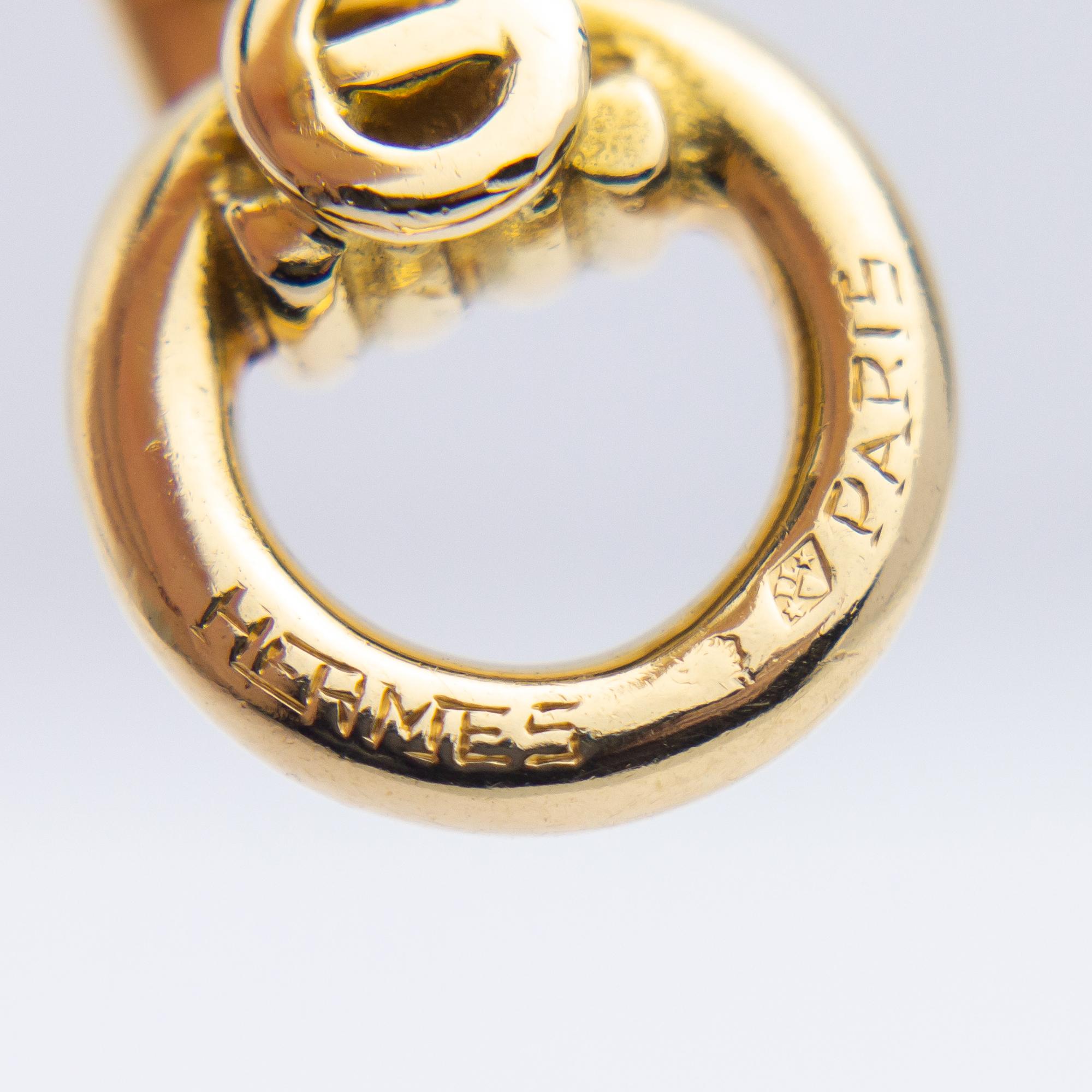 Clips d'oreilles Hermès Paris en or jaune 18 carats Unisexe en vente