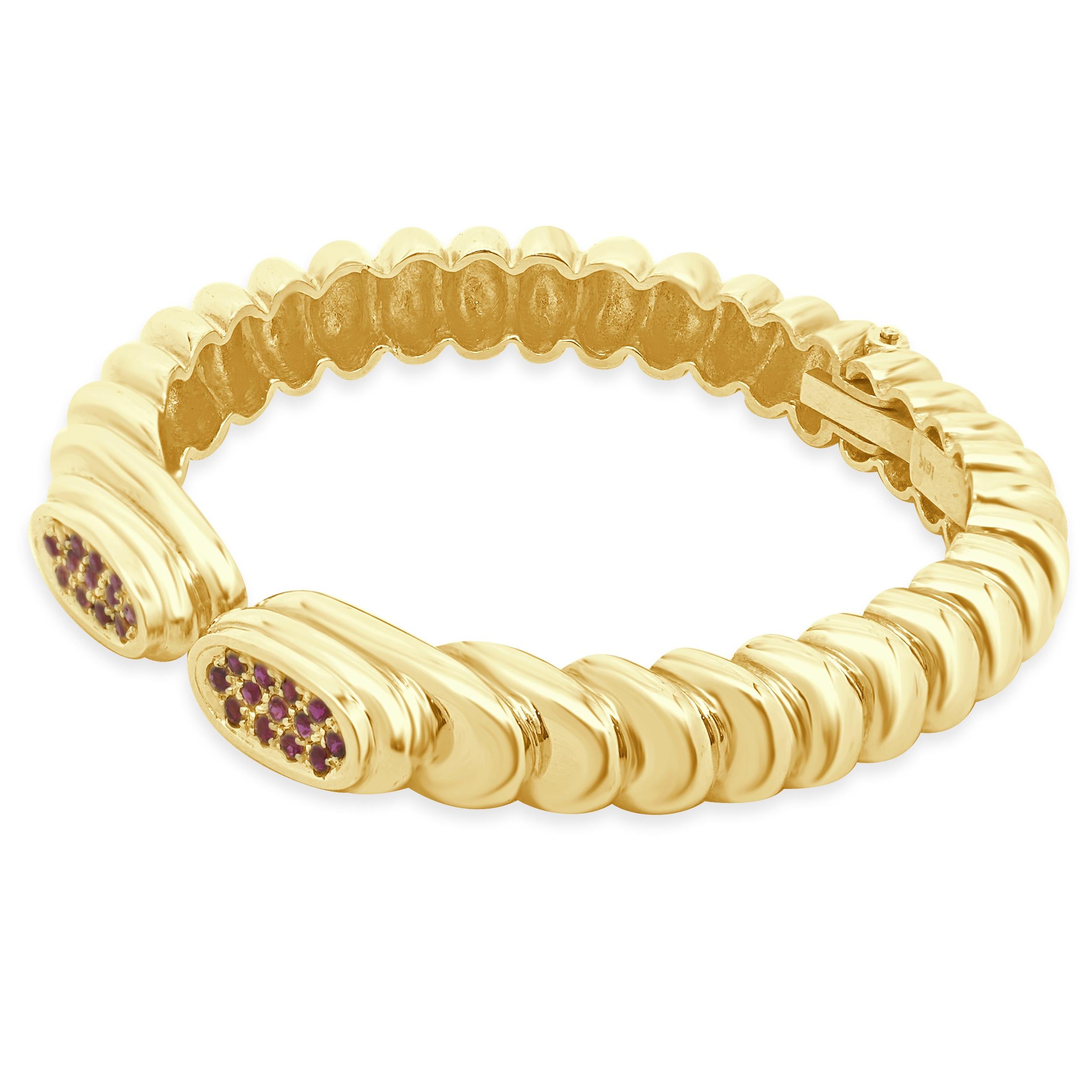 Designer: custom
Material: 18K yellow gold
Ruby: 26 round cut = 0.80cttw
Dimensions: bracelet will fit up to a 6-inch wrist
Weight: 34.00 grams
