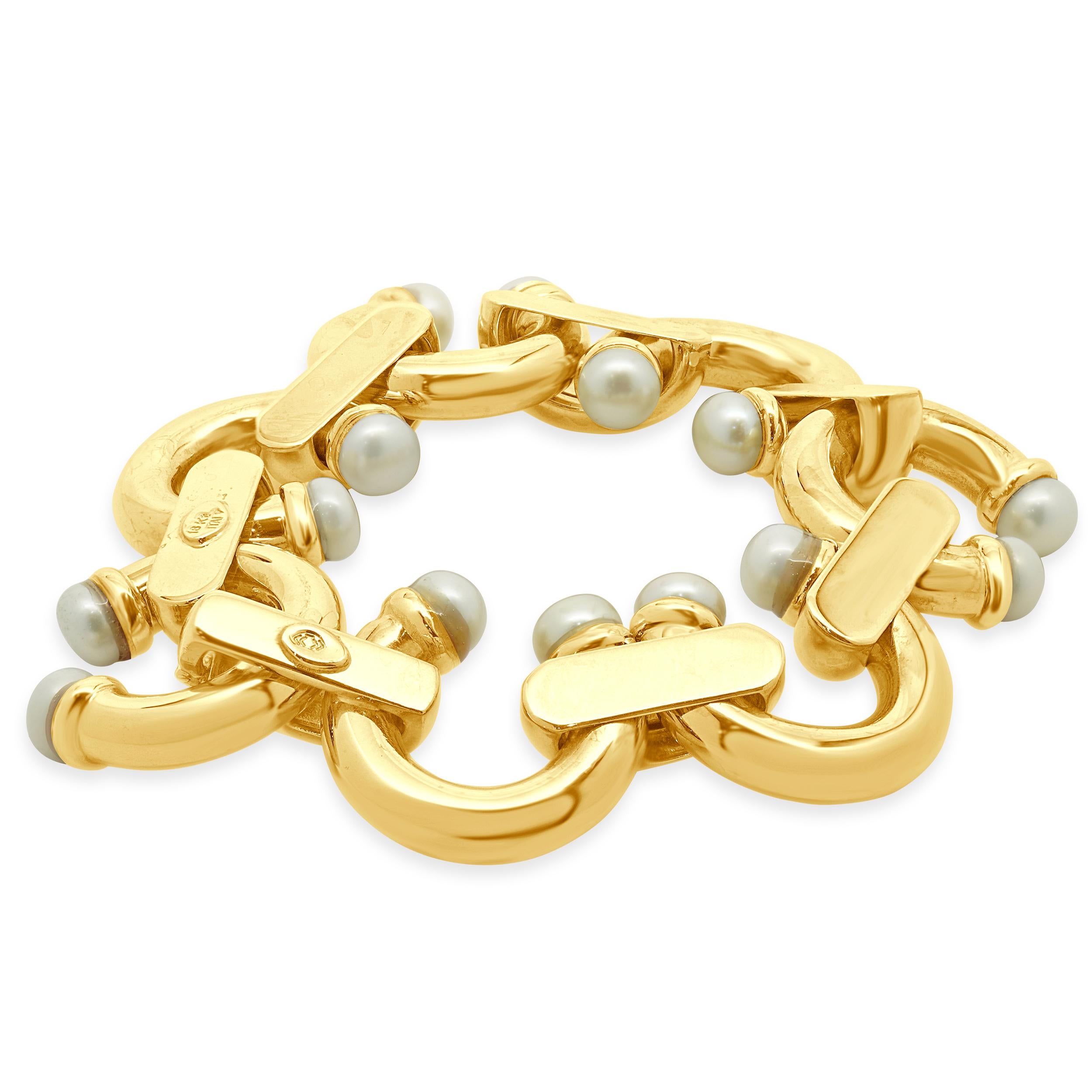 Designer: kundenspezifisch
MATERIAL: 18K Gelbgold
Abmessungen: Das Armband passt an ein Handgelenk von bis zu 6 Zoll
Gewicht: 46,72 Gramm