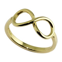 18 Karat Yellow Gold Infinity Ring