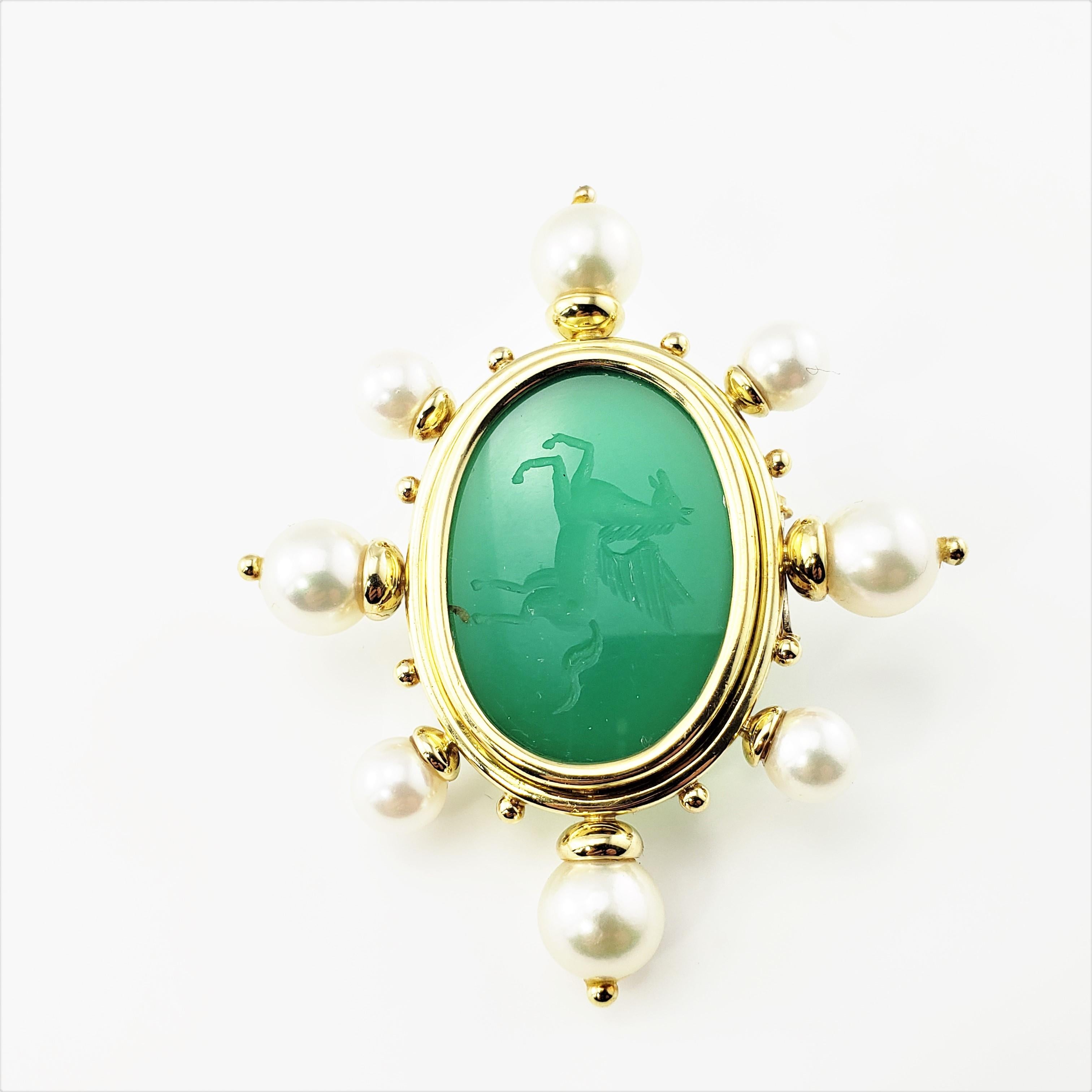 18 Karat Yellow Gold Intaglio Green Onyx and Pearl Pegasus Brooch/Pin-

This exquisite brooch features a carved pegasus in beautiful green onyx surrounded by eight white pearls (7-9 mm each).  Set in beautifully detailed 18K yellow gold.

Size: 2.4