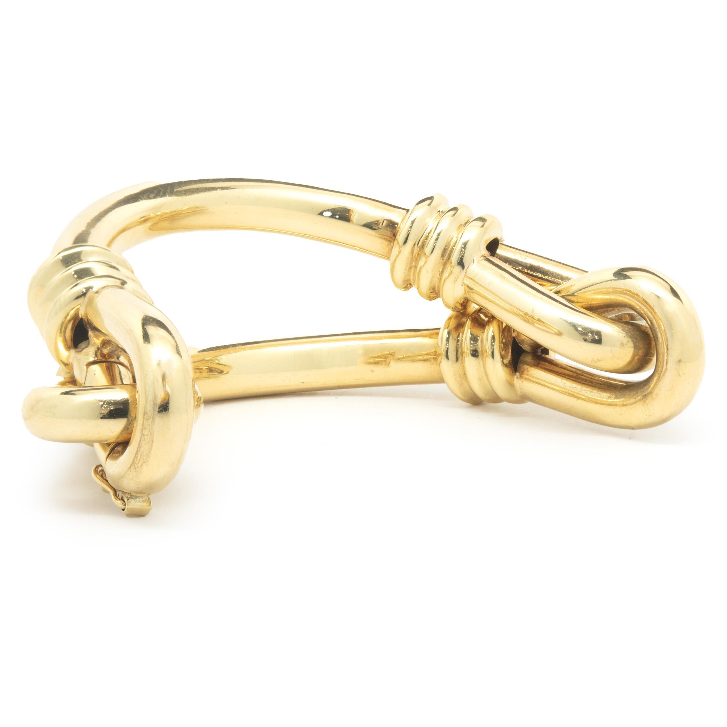 Material: 18K yellow gold
Dimension: bracelet will fit up to a 6.5-inch wrist 
Weight: 50.72 grams