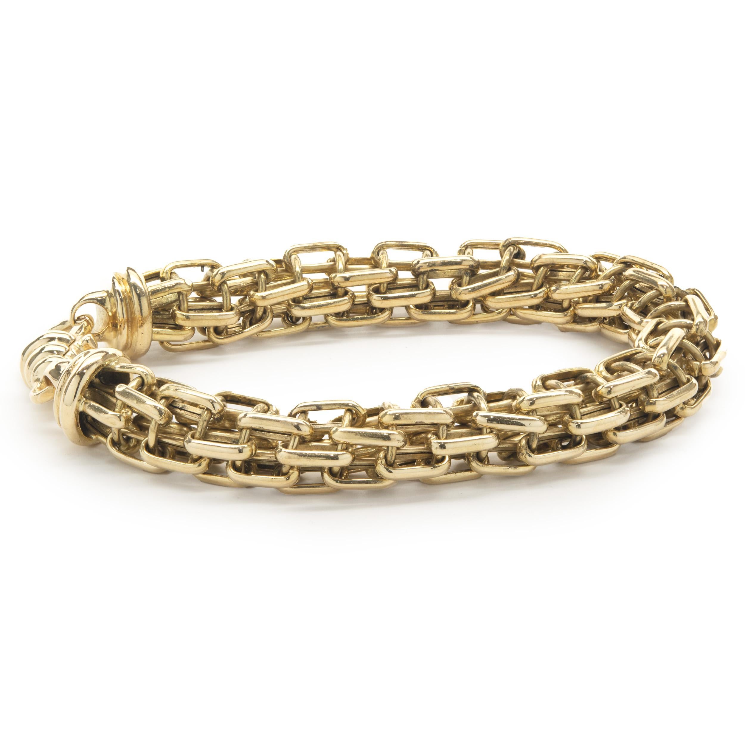 Material: 18K yellow gold
Dimensions: bracelet will fit up to a 8.5-inch wrist
Weight: 46.09 grams