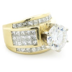 18 Karat Yellow Gold Invisible Set Diamond Ring with CZ Center