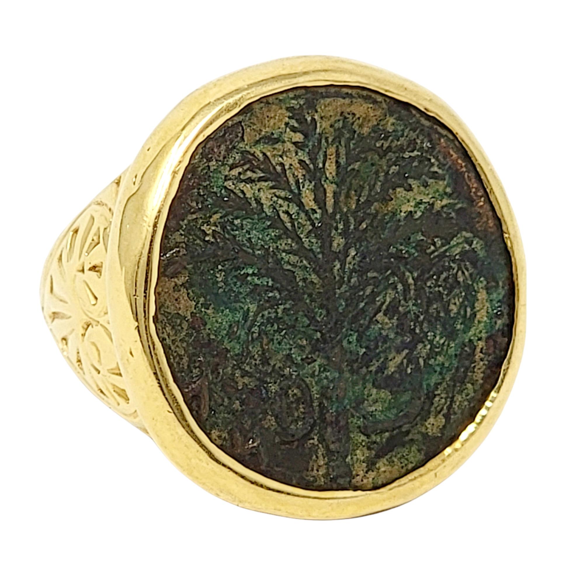 Ring size: 8.5

Show off an incredible piece of history set in a stunning ancient coin ring! This rare, bronze Barakat Shim'on Bar-Kochba coin from 132-135 CE is beautifully detailed with a symbolic 7 front palm tree motif.  The intricate detail