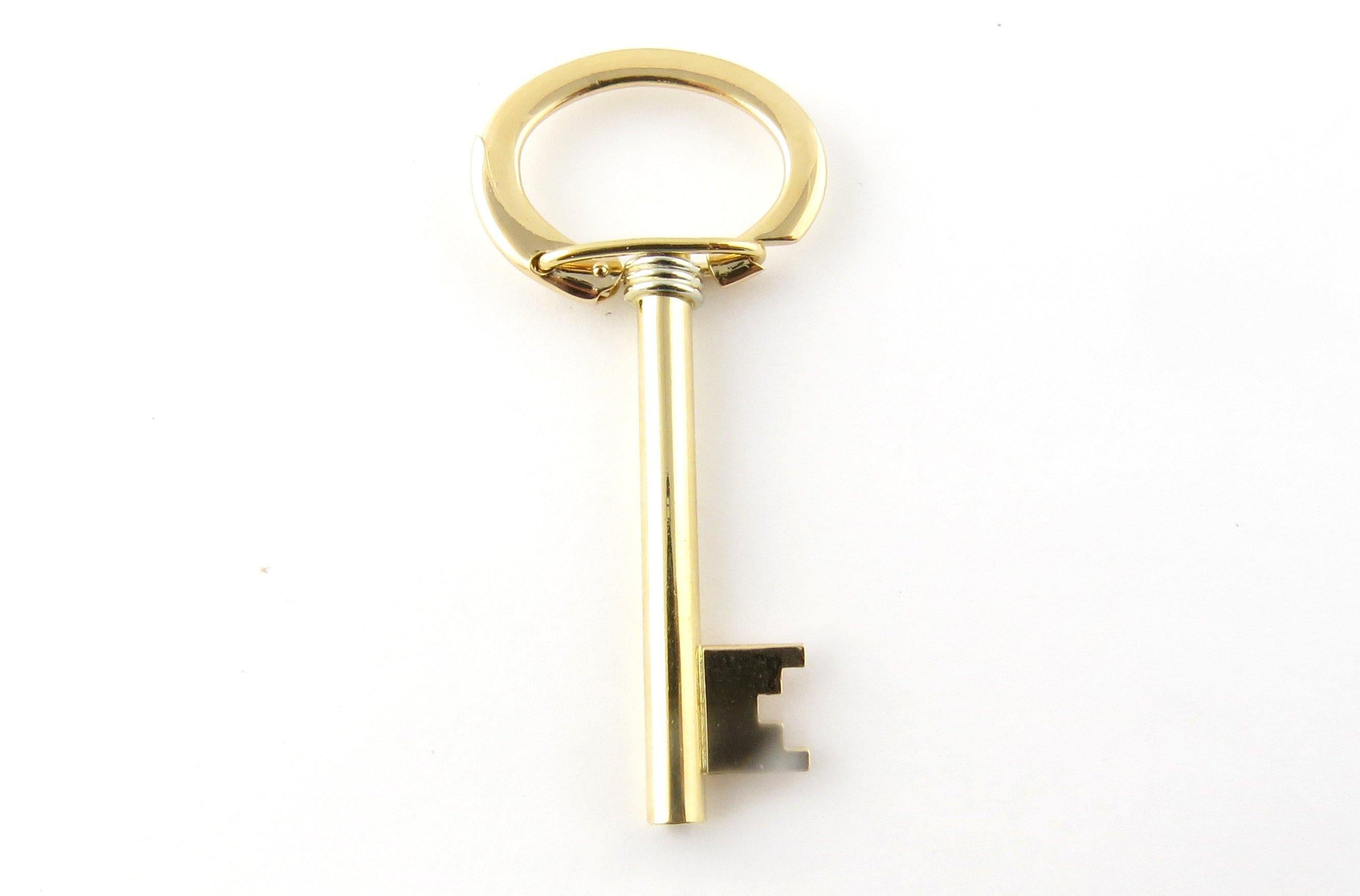 Vintage 18 Karat Yellow Gold Key Ring
This elegant key ring features a 3D skeleton key meticulously detailed in 18K yellow gold. 
Size: 55 mm x 25 mm 
Weight: 5.7 dwt. / 8.9 gr. 
Hallmark: 750 
Very good condition, professionally polished. 
Will