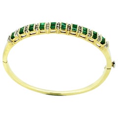 18 Karat Yellow Gold Ladies Bangle, with Emeralds and Diamonds, circa 1940