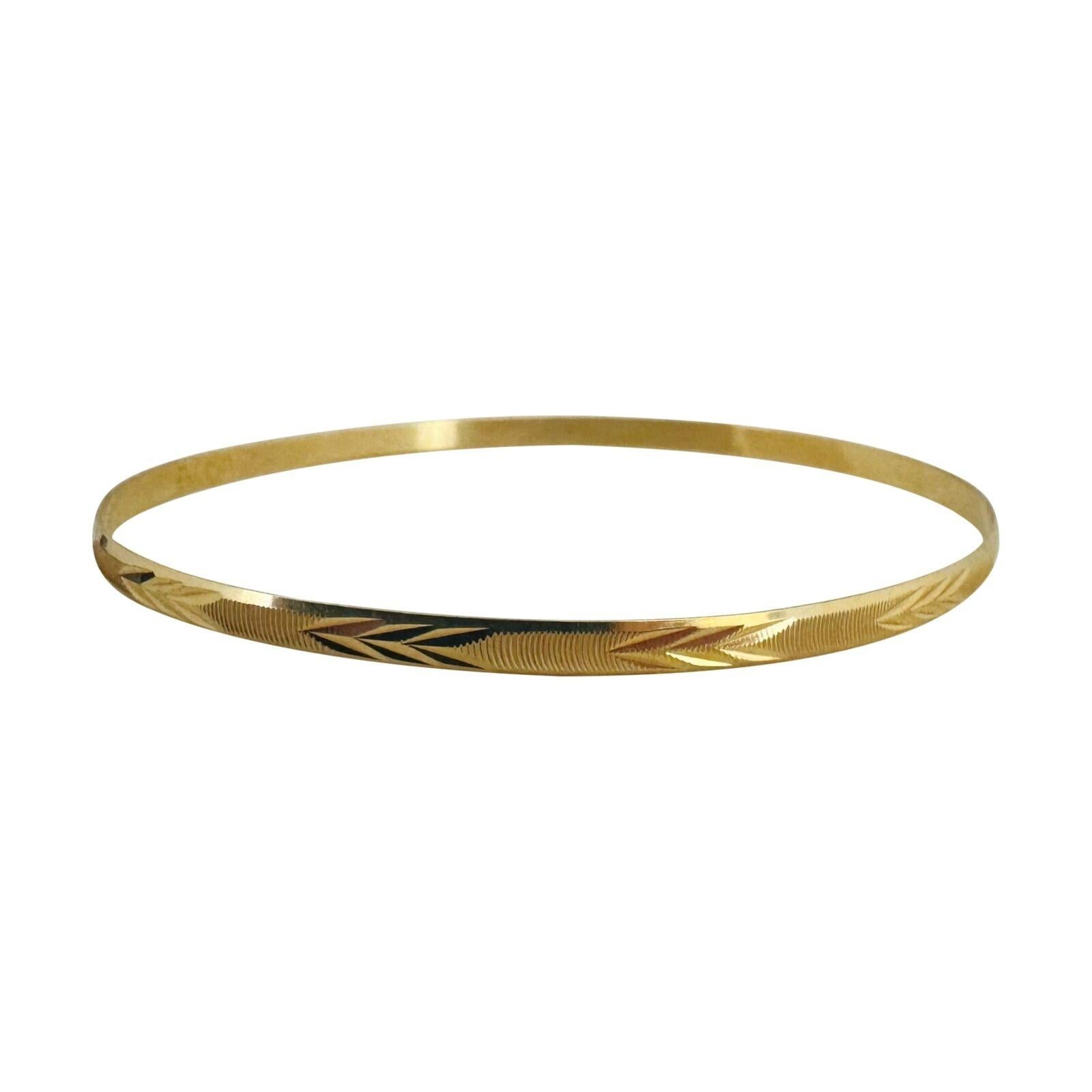 18 Karat Yellow Gold Ladies Diamond Cut Fancy Bangle Bracelet  In Good Condition For Sale In Guilford, CT