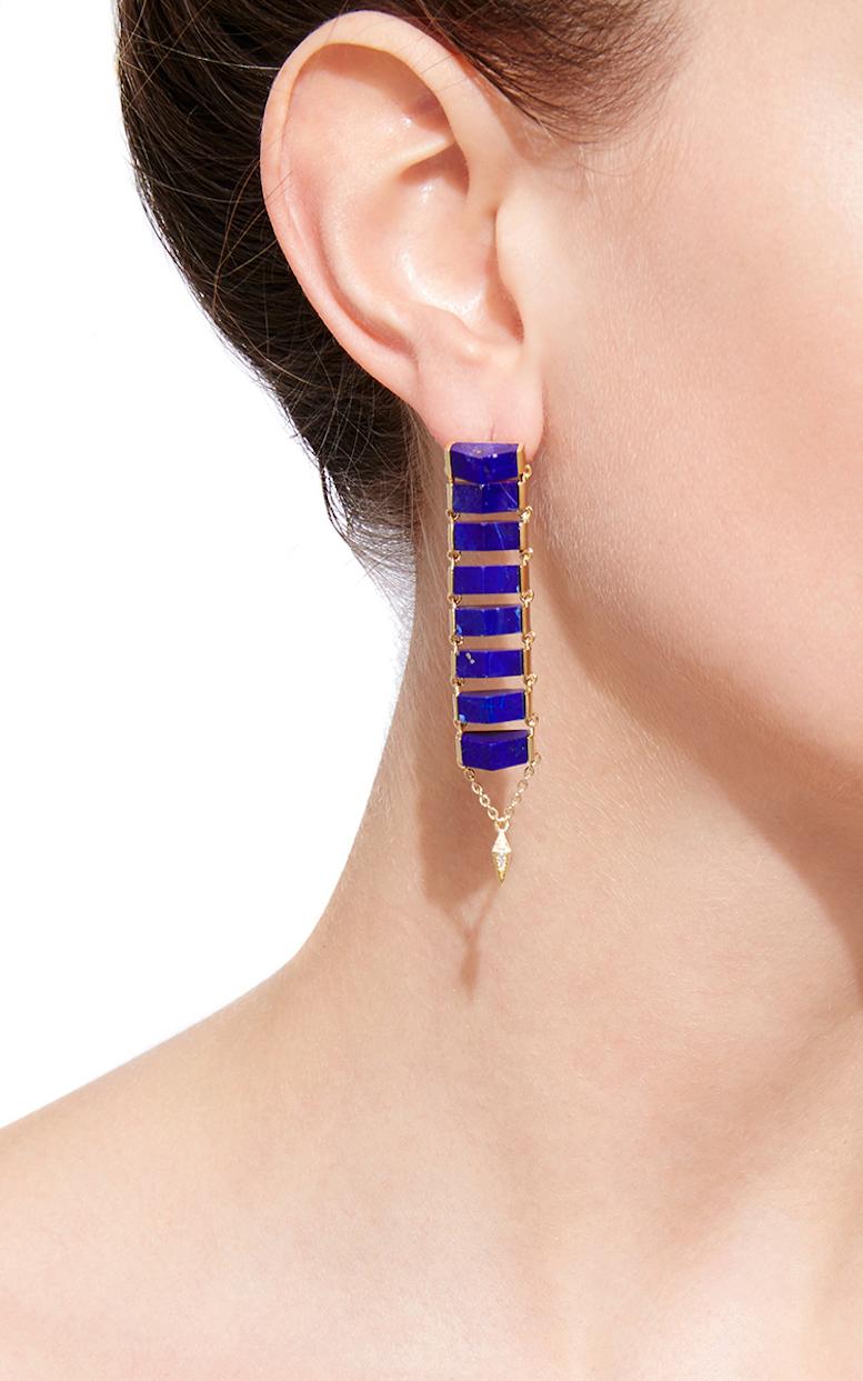 Lapis Lazuli and Diamond Ladder Earrings feature eight slices of Lapis on each earring set downward in a linear pattern in Yellow Gold and finished with Yellow Gold chain and White Diamond Pyramid Tips 
18k Yellow Gold, Lapis Lazuli, White Diamonds