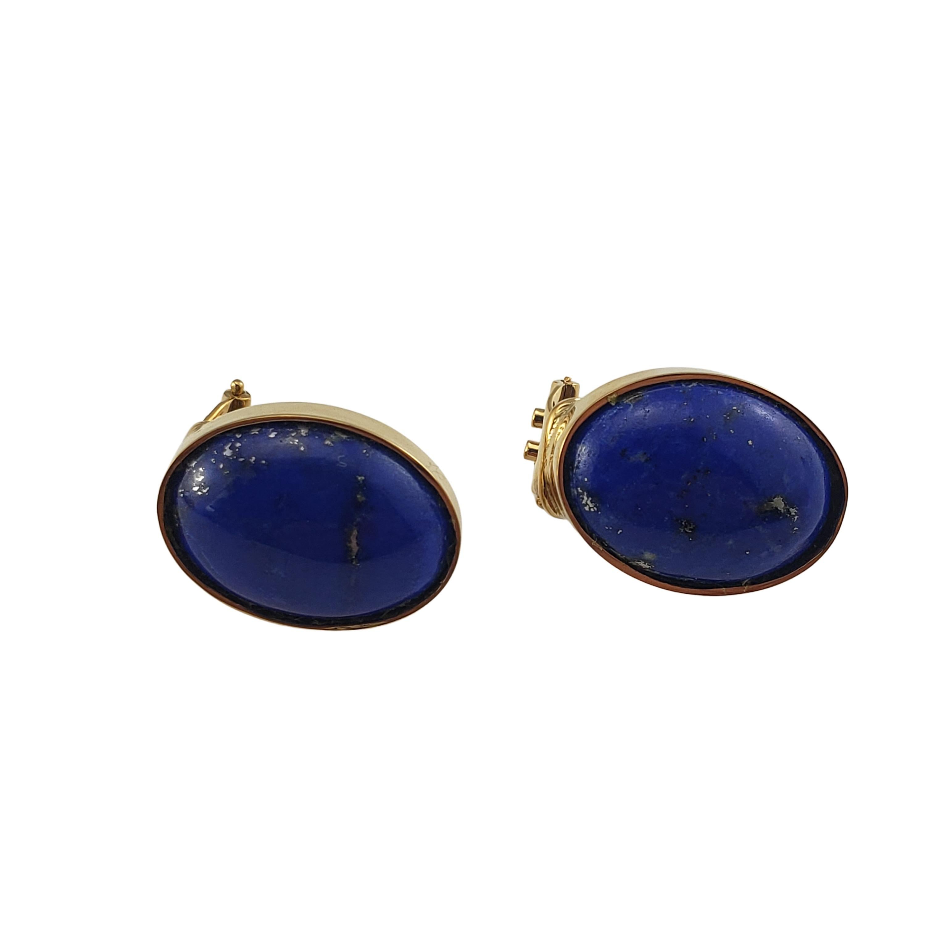 18 Karat Yellow Gold Lapis Lazuli Earrings-

These lovely earrings each feature one oval lapis lazuli gemstone set in classic 18K yellow gold.  Hinged closures.

Size: 19 mm x 14 mm

Weight:  6.4 dwt. /  10.1 gr.

Stamped: 18K  750 

Very good