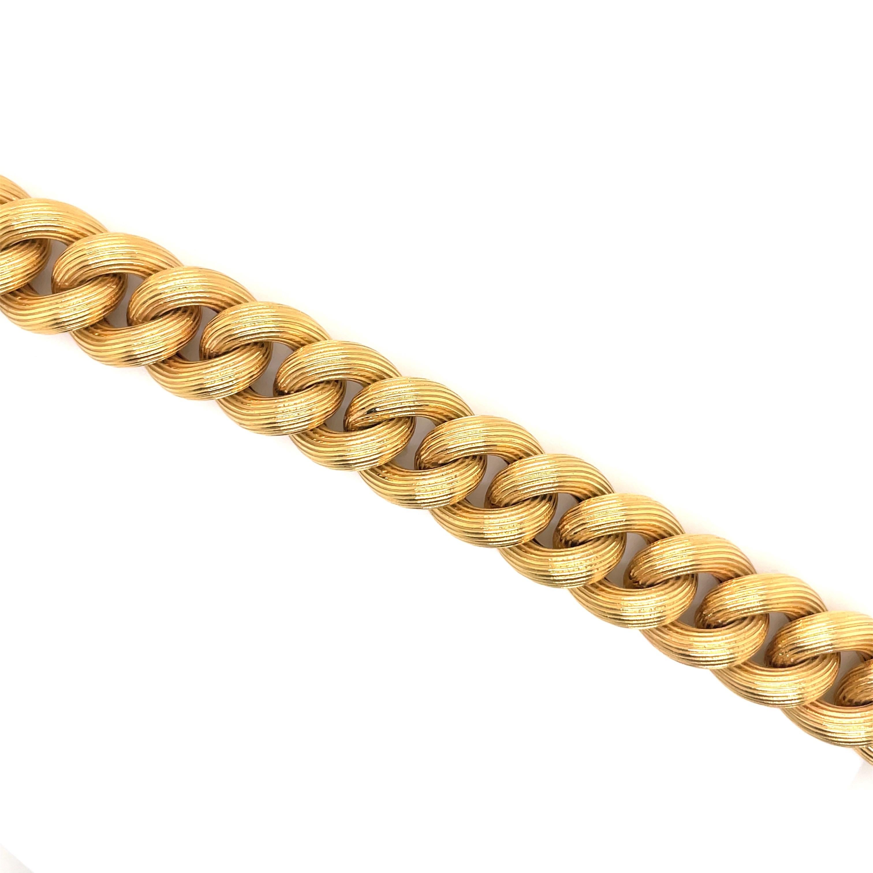 18 Karat Yellow Gold Cuban Link Bracelet 61.9 Grams In Excellent Condition For Sale In New York, NY