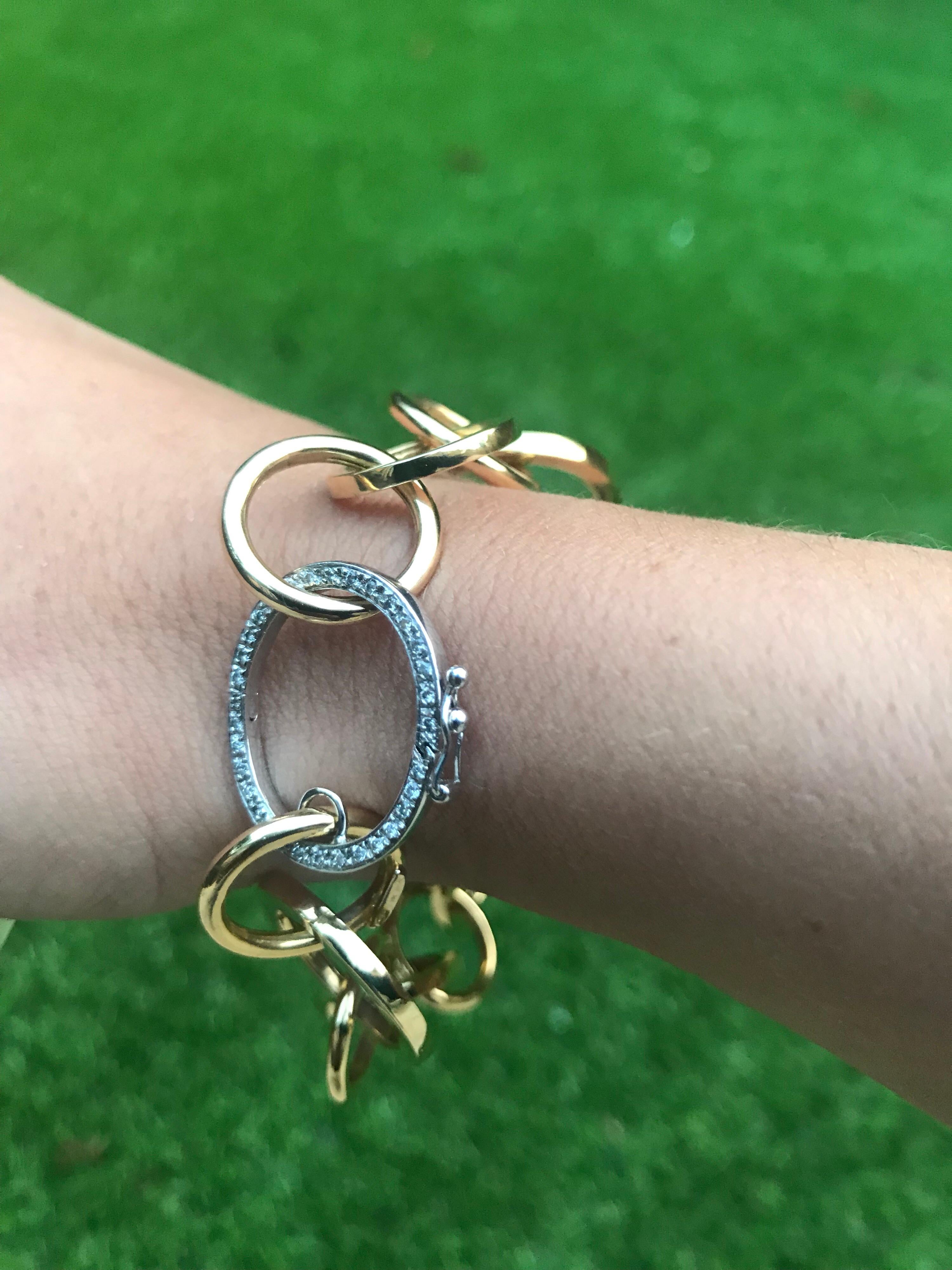A contemporary take on the classic chain bracelet. This 18kt Yellow Gold bracelet is perfect for everyday wear with the White Diamond set clasp whisking you effortlessly away into cocktail hour. 66 White Brilliant cut Diamonds are set in the 18kt