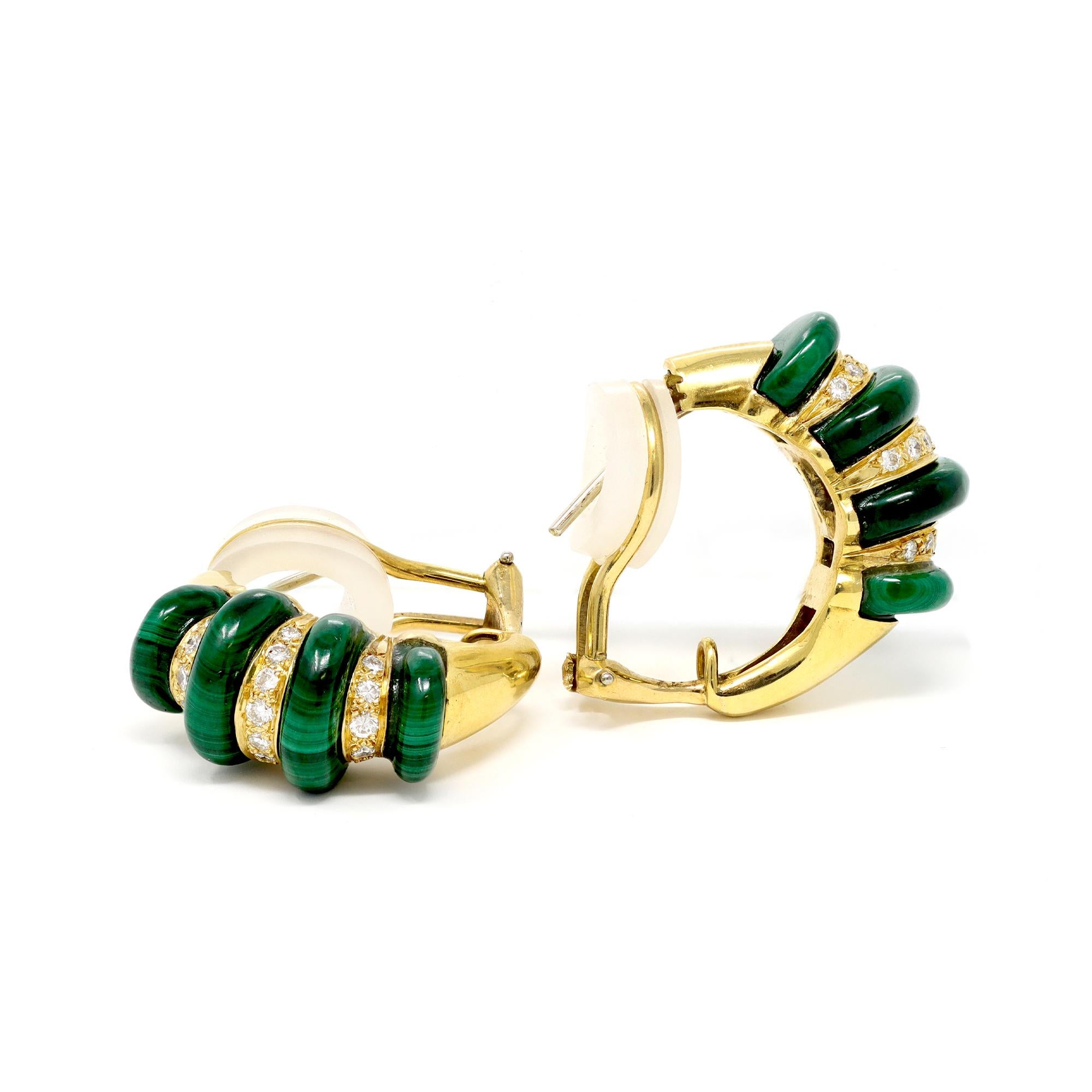 A pair of Modern Striped malachite and diamond hoop earrings circa 1970. Styled in 18 karat yellow gold these earrings are stamped CY. The estimated weight of the diamonds is 0.44 carats of GH color and VS-SI clarity. The gross weight is 15.9 grams.