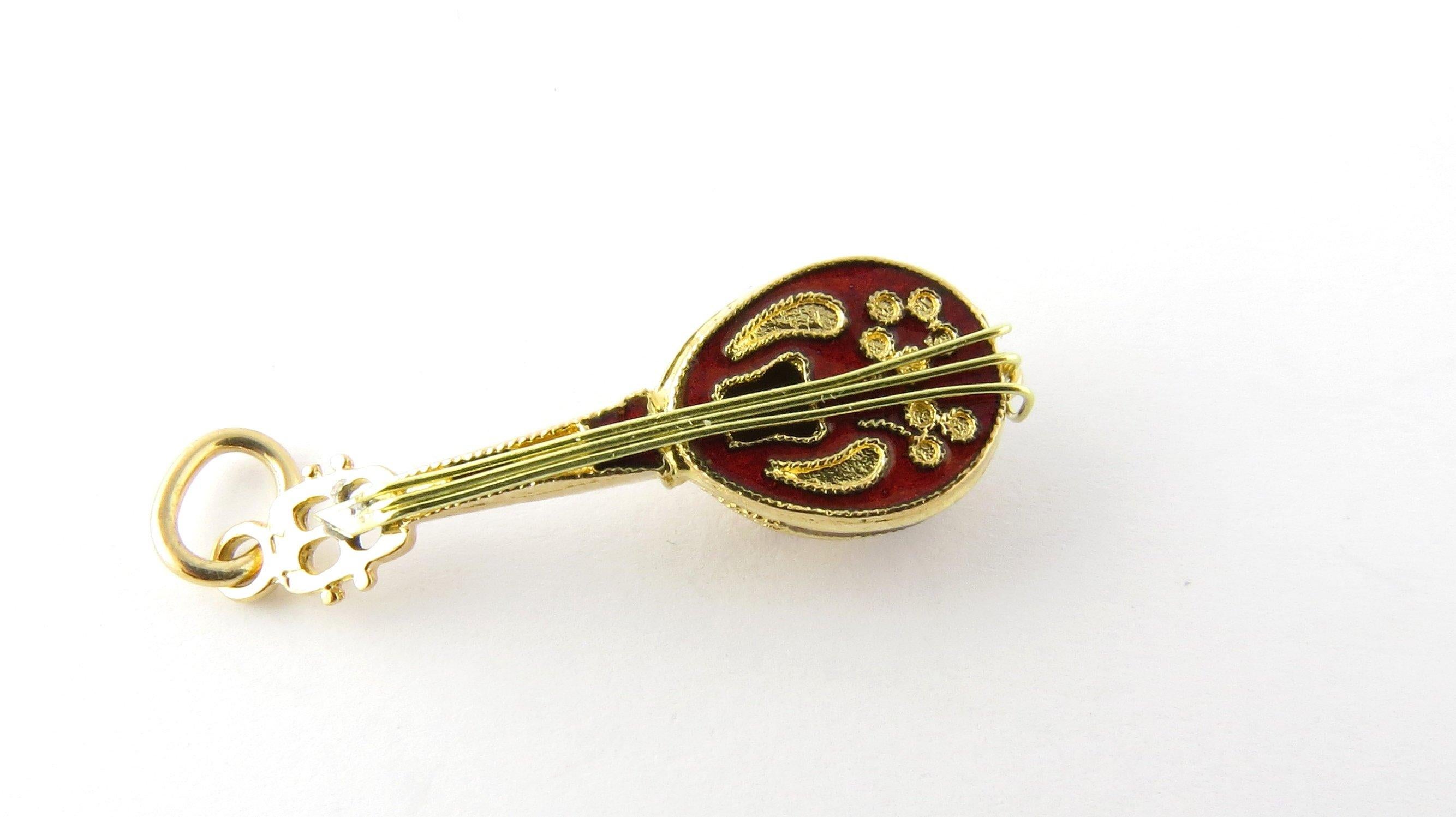 Vintage 18 Karat Yellow Gold Mandolin Charm

Perfect gift for the musician in your life!

This 3D charm features a miniature mandolin meticulously detailed in 18K yellow gold and accented with red enamel.

Size: 29 mm x 10 mm (actual charm)

Weight: