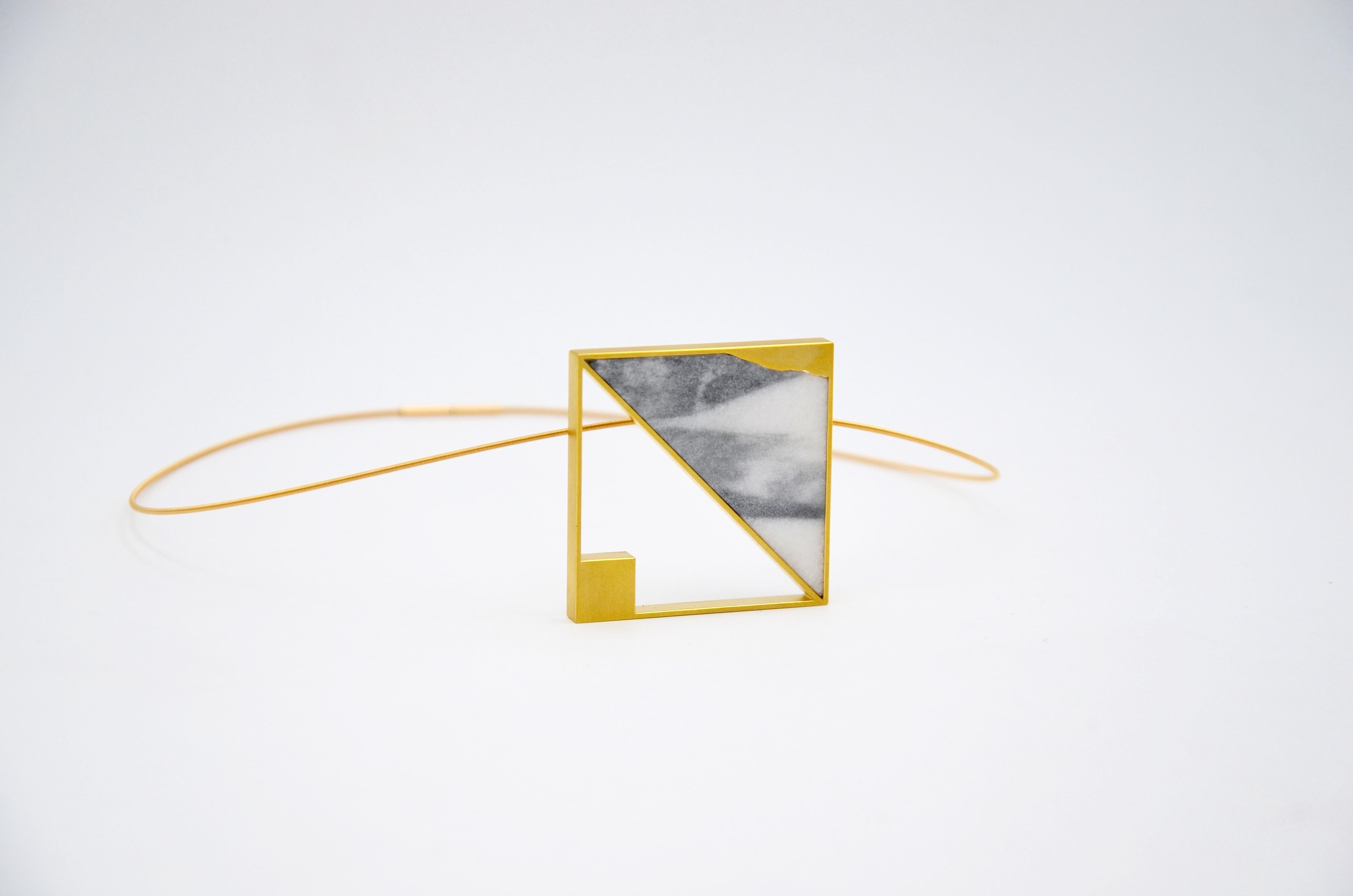 Contemporary 18 karat Yellow Gold Marble Pendant

Looking at the clouds passing by in the sky, being present in the now, finding stillness, creating space within to allow the simple joys to be fully felt. This creation by Arno Schneider is embracing
