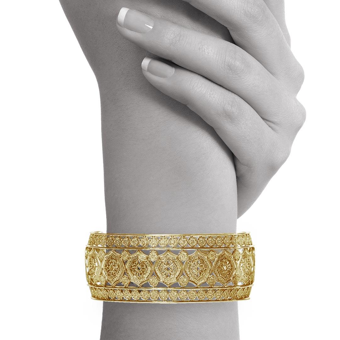 Part of the brand new 'Mauresque' collection by Natalie Barney, this cuff bracelet is unique whilst being comfortable. Wear it to a special event or every day.

Made in 18 Karat Yellow Gold.  Please request the video for an even closer view of this