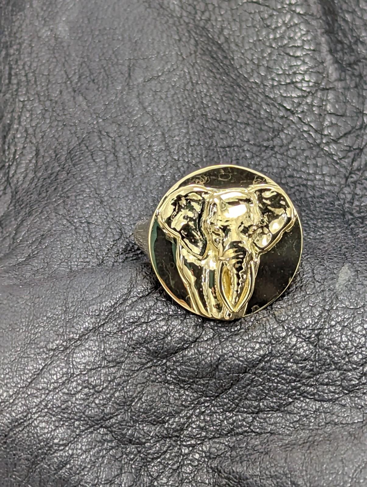 For Sale:  18 Karat Yellow Gold Men's Elephant 2 Tusks Signet Ring 9