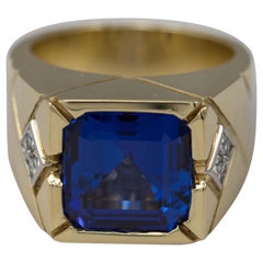 18 Karat Yellow Gold Men’s Emerald Cut Tanzanite and Diamond Ring 12.02 Carat