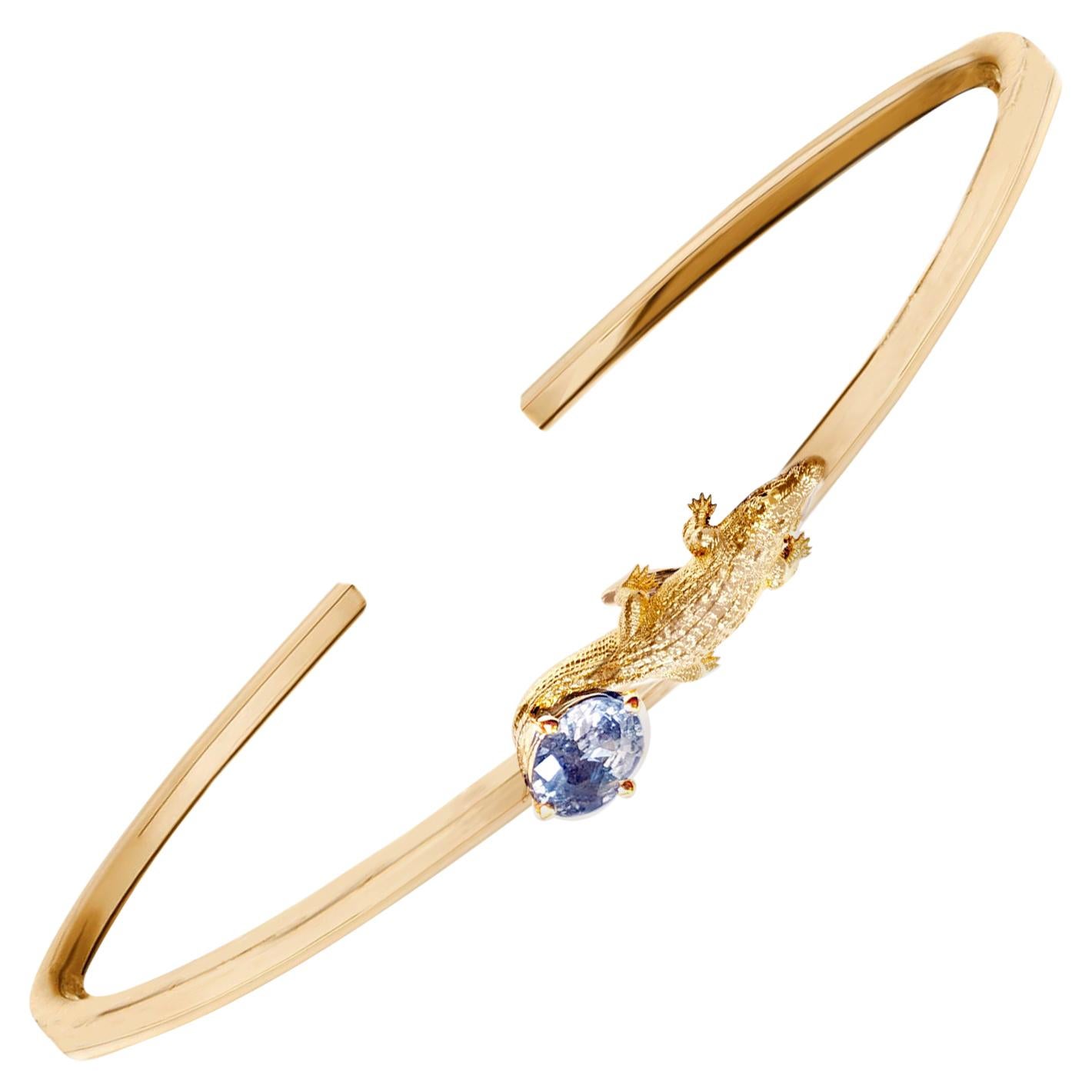 Eighteen Karat Yellow Gold Mesopotamian Bracelet with Light Blue Sapphire