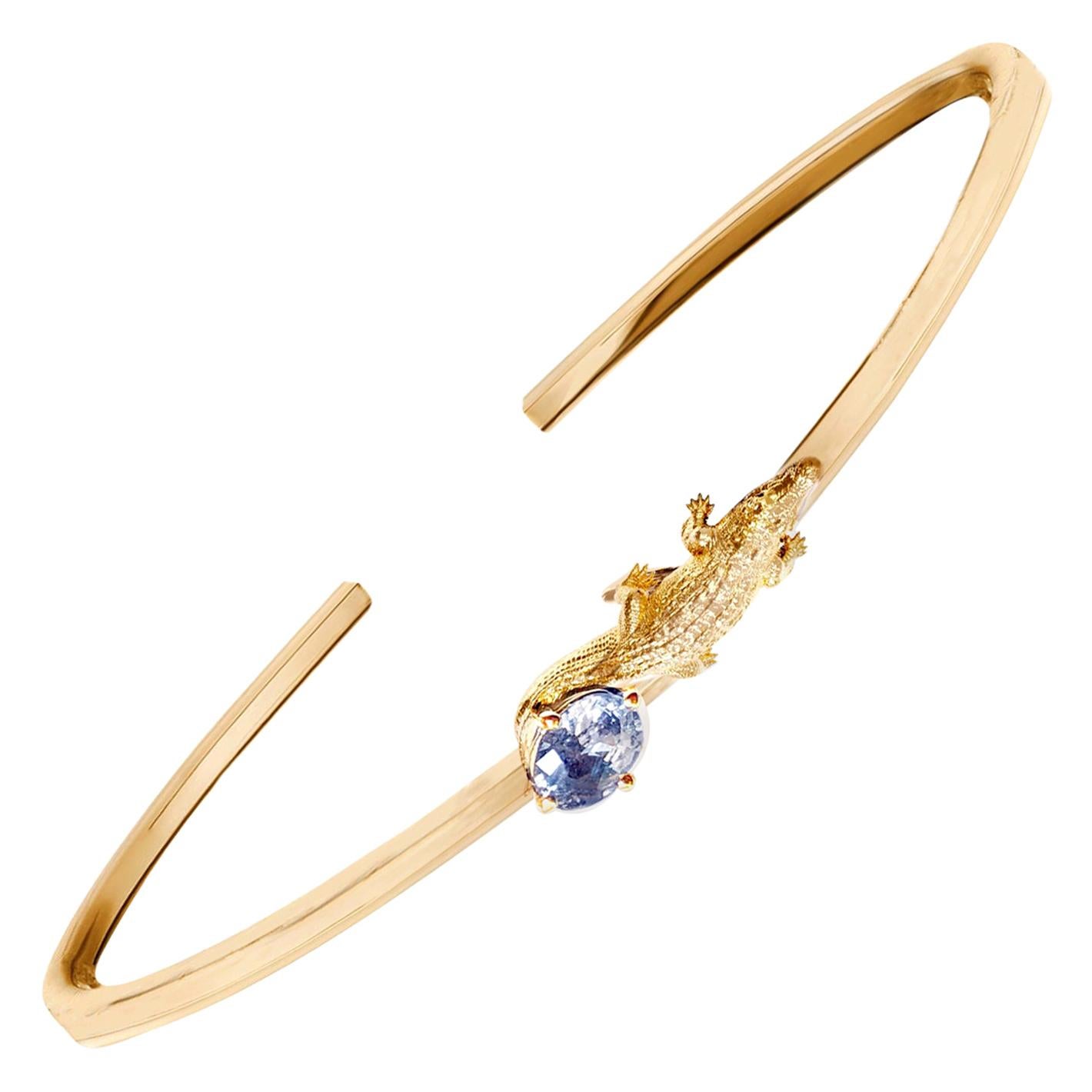 18 Karat Yellow Gold Mesopotamian Bracelet with 0.65 Carats Light Blue Sapphire For Sale