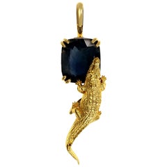 Eighteen Karat Yellow Gold Pendant Necklace with Four Carats Cushion Sapphire