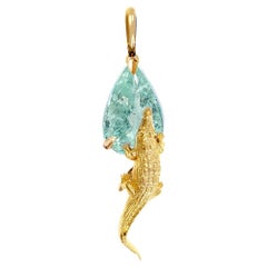 Collana con ciondolo Mesopotamico in oro giallo a diciotto carati e tormalina Paraiba