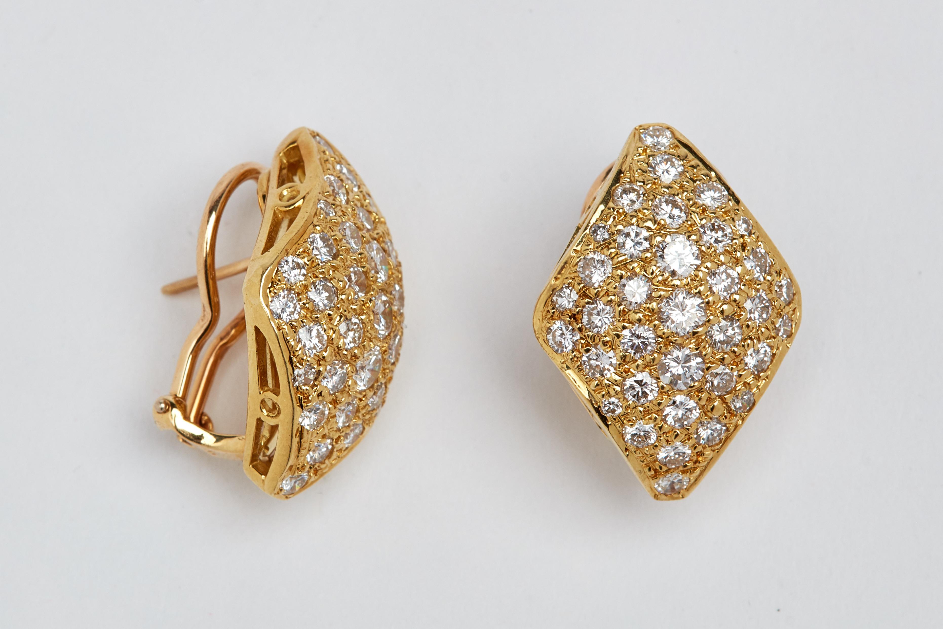 18k yellow gold micro pave earrings with 4.50 carats of white round diamonds. 
