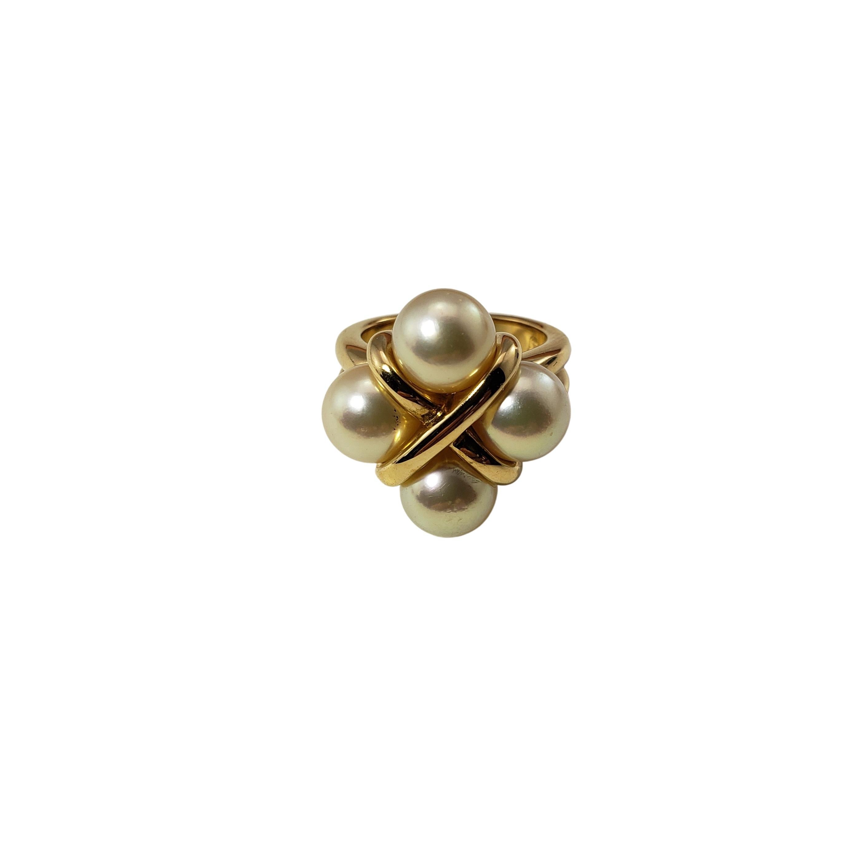 18 Karat Yellow Gold Mikimoto Pearl Ring Size 6-

This stunning ring features four Mikimoto pearls (8 mm) set in beautifully detailed 18K yellow gold.  Width:  21 mm.  Shank:  4 mm.

Ring Size: 6

Weight:  9.3 dwt. /  g14.5 r.

Hallmark:  DCP  750 