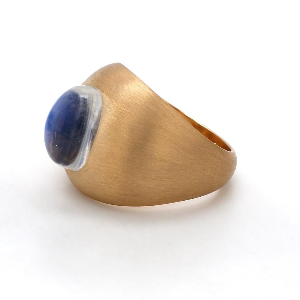 A Beautiful Handcrafted Ring in 18 Karat Yellow Gold . This Ring is Studded with a vibrant Cabochon Moonstone of outstanding brilliance & clarity. A Statement Piece in Itself, is perfect for Evening Wear 

Natural Center MoonStone Details
Pieces : 1