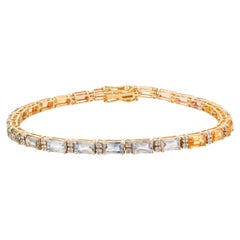 Bracelet tennis en or jaune 18 carats avec plusieurs saphirs précieux et diamants