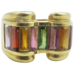 Bague en or jaune 18 carats et pierres multicolores