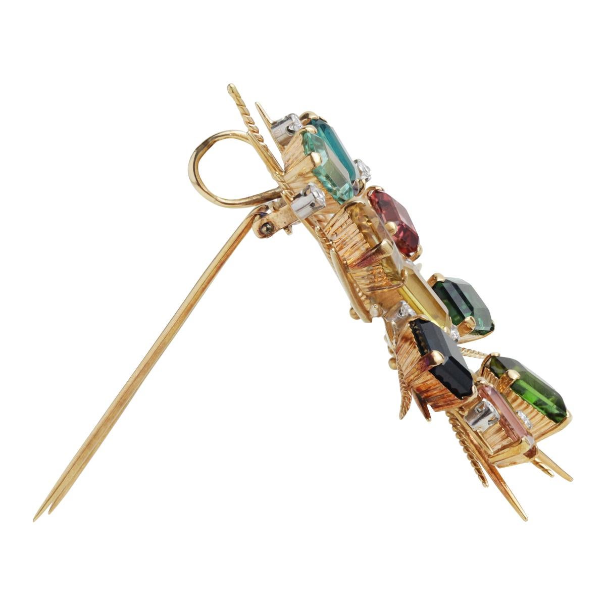 Wow, this is one beautiful brooch or pendant. Who would have thought tourmaline comes in such a wonderful varieties of colours. From deep teal greens, to golden yellows, soft pinks and the palest of blues - this will work back well with any outfit.