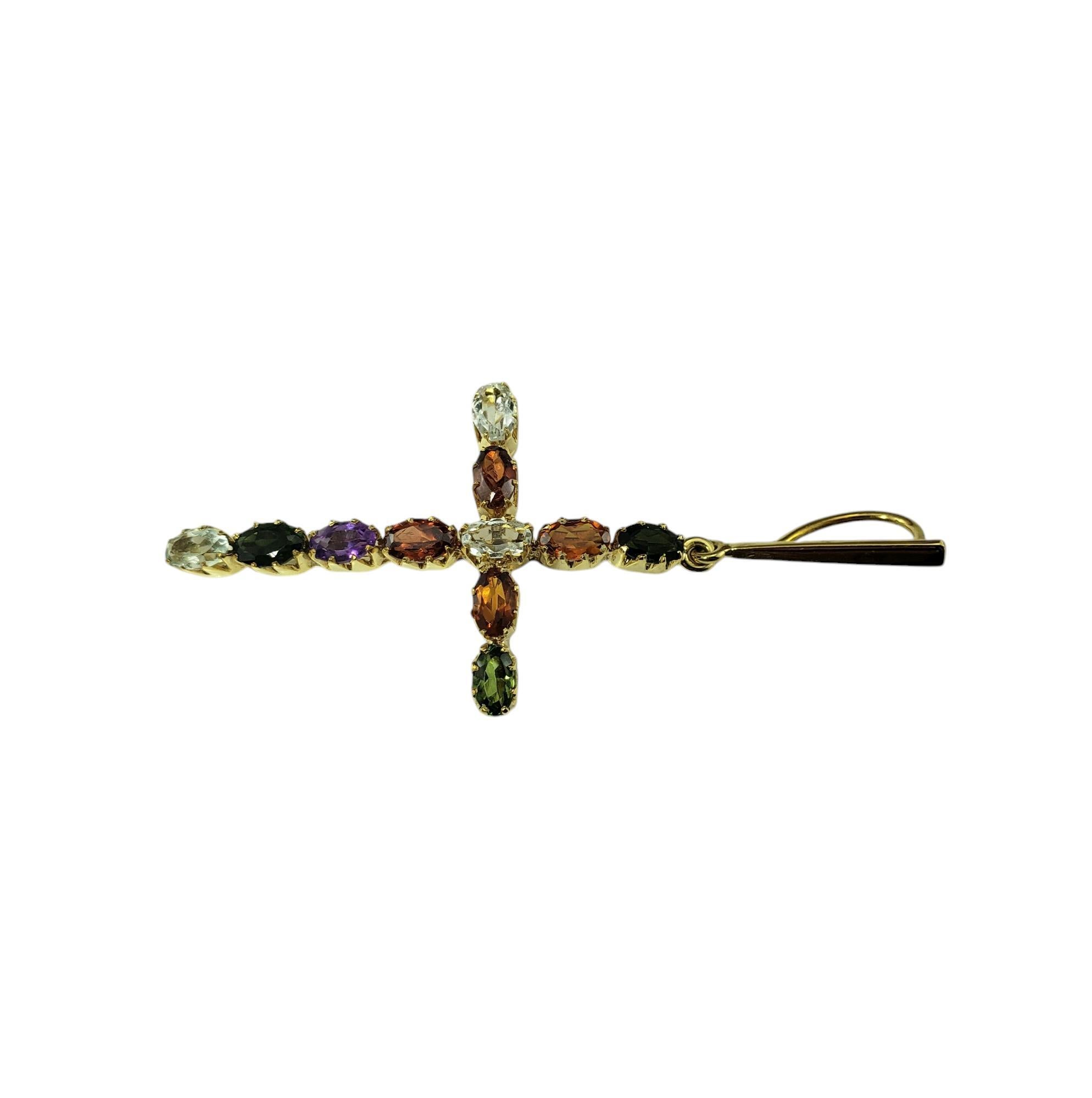 Pendentif croix en or jaune 18 carats à pierres multiples JAGi Certified-

Ce pendentif croix coloré comprend trois tourmalines vertes ovales (.93 ct.), quatre citrines ovales (.80 ct.), une améthyste ovale (.20 ct.), deux aigues-marines ovales (.40